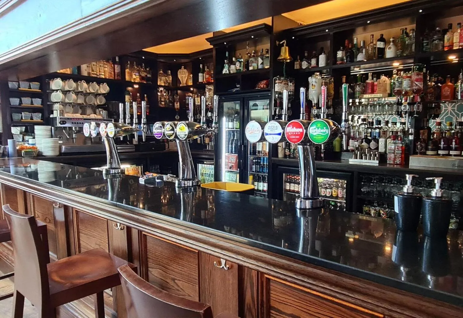 Lounge or bar in The Harboro Hotel