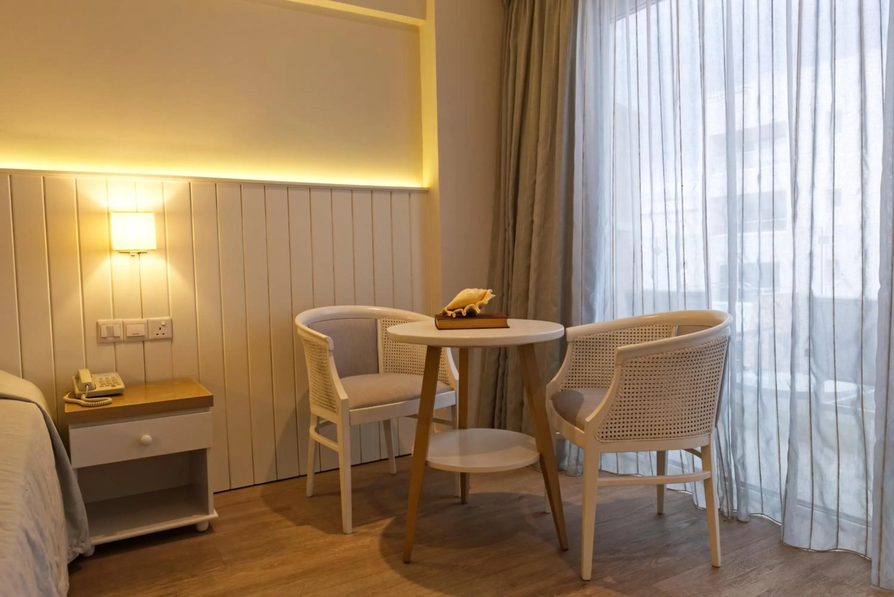 Seating area in Sunrise Gardens Aparthotel