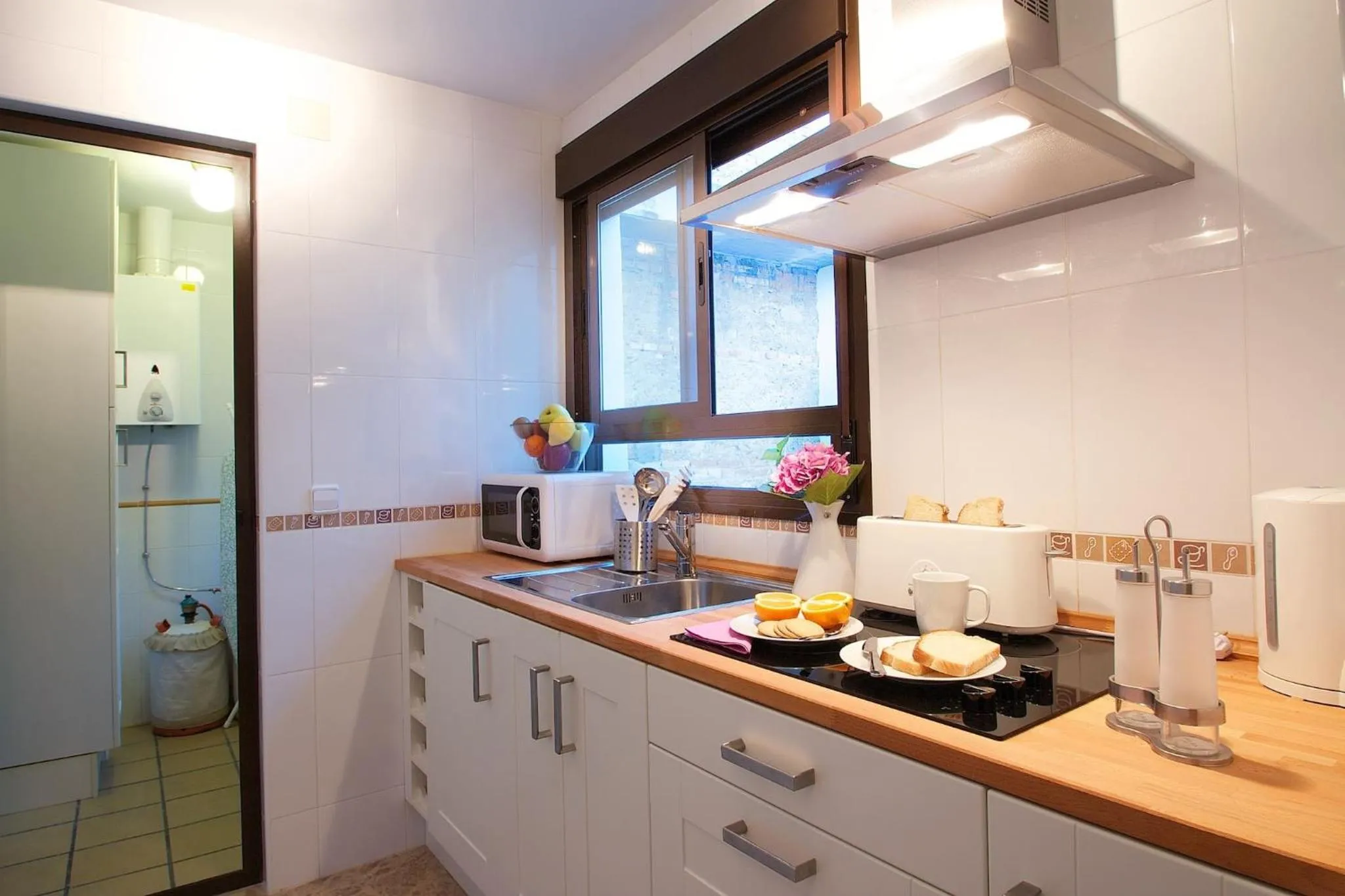 Kitchen or kitchenette in Apartamentos Turísticos Duque de Hornachuelos