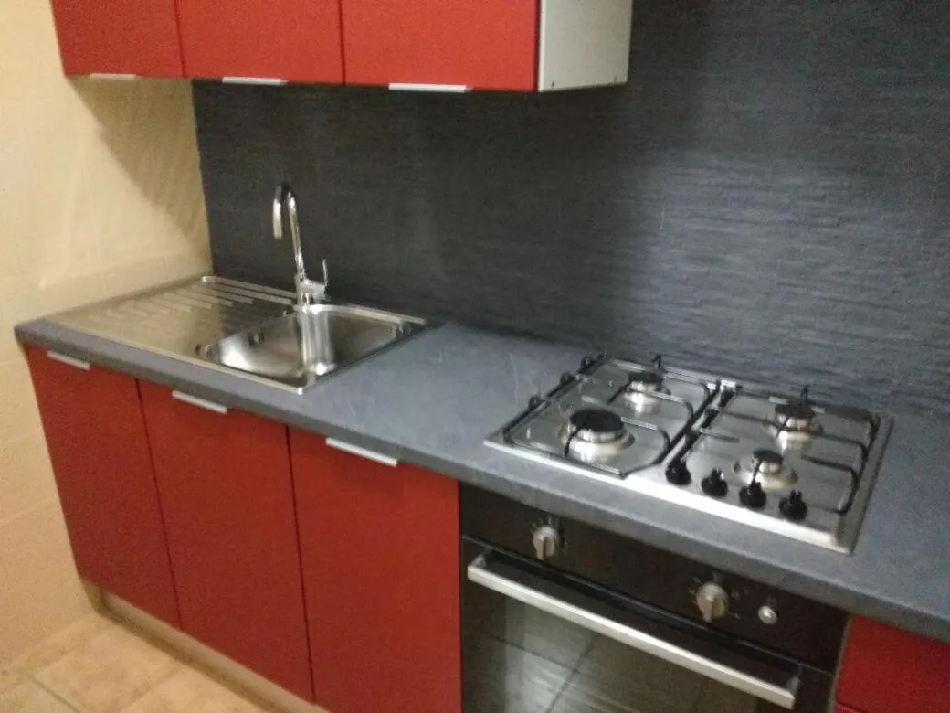 Kitchen or kitchenette in Stanza in Villa con giardino vista mare