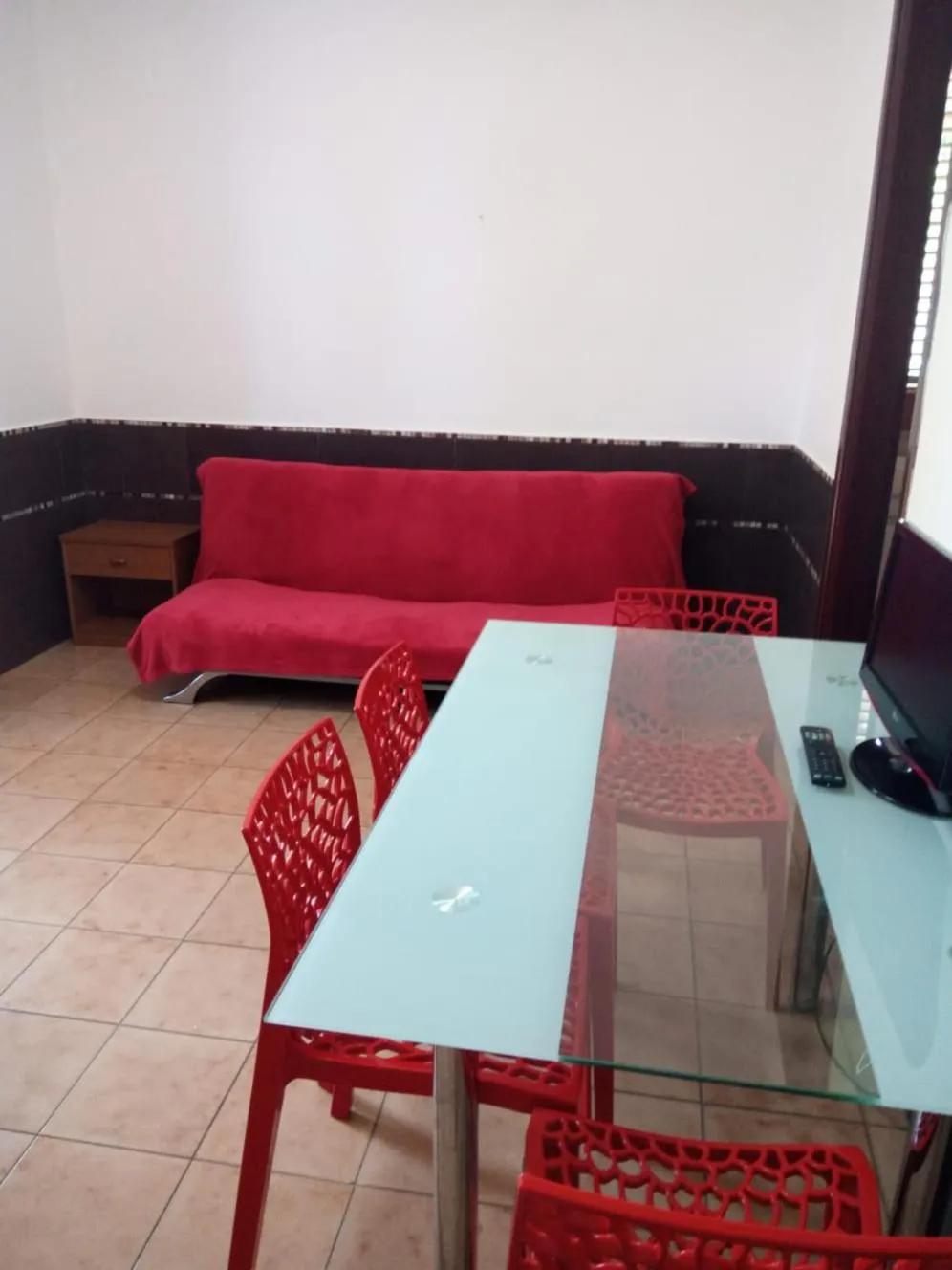 Living room in Stanza in Villa con giardino vista mare