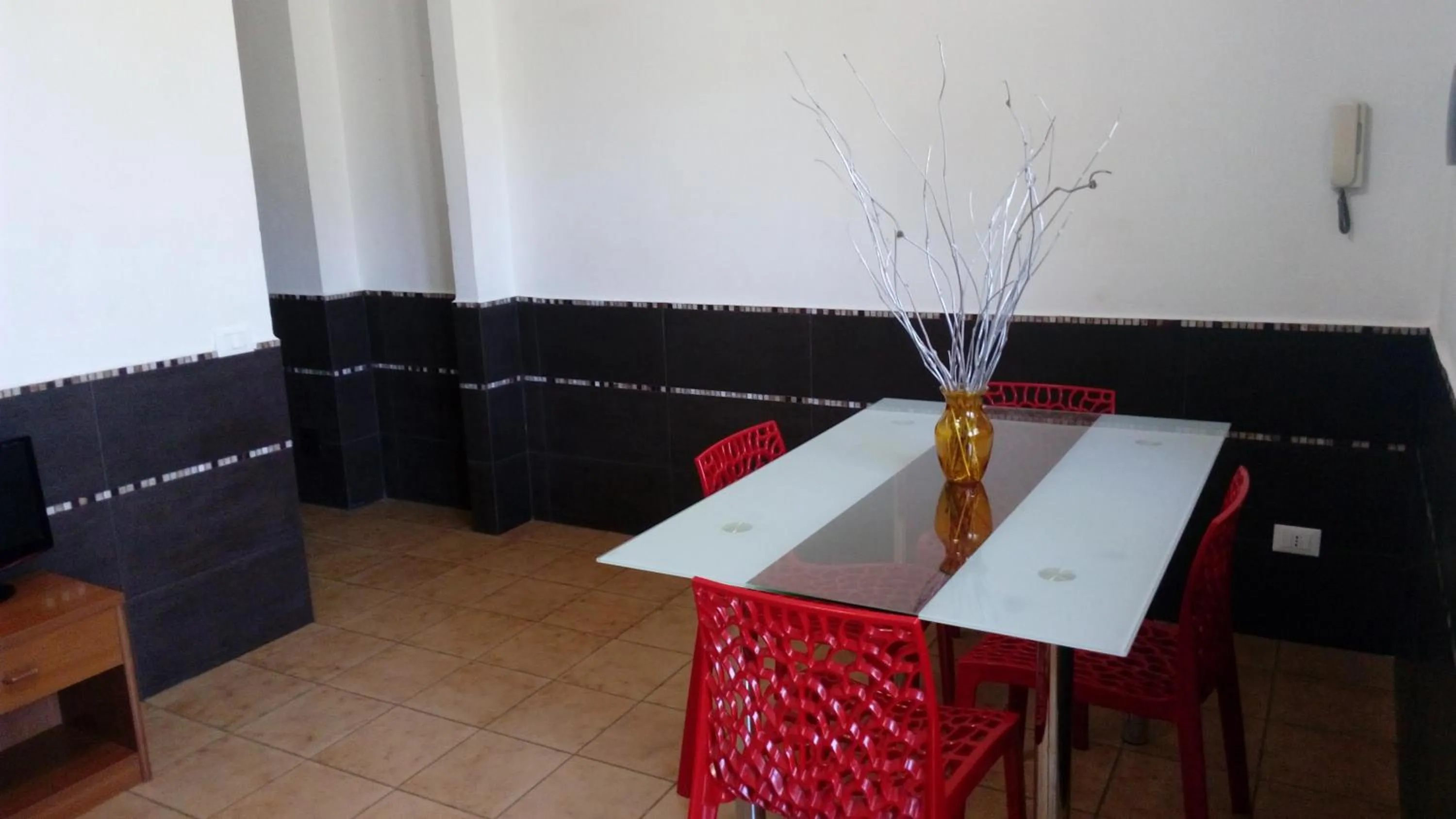 Living room in Stanza in Villa con giardino vista mare