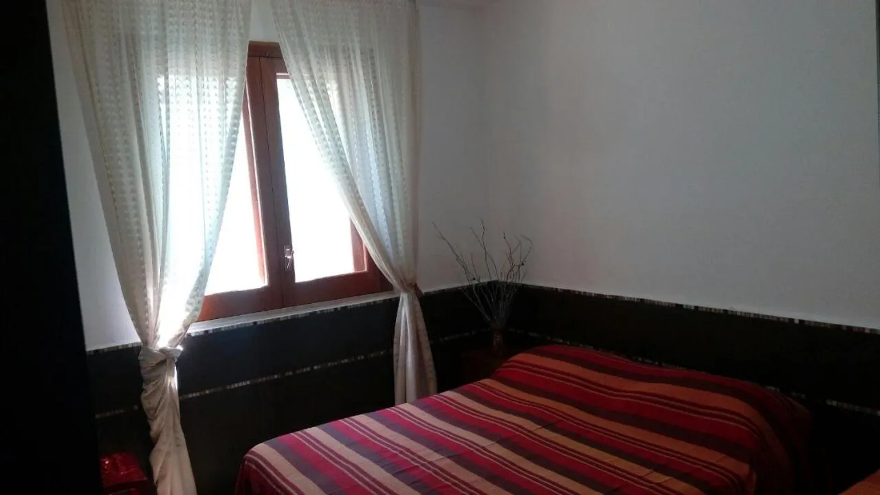 Bedroom, Bed in Stanza in Villa con giardino vista mare