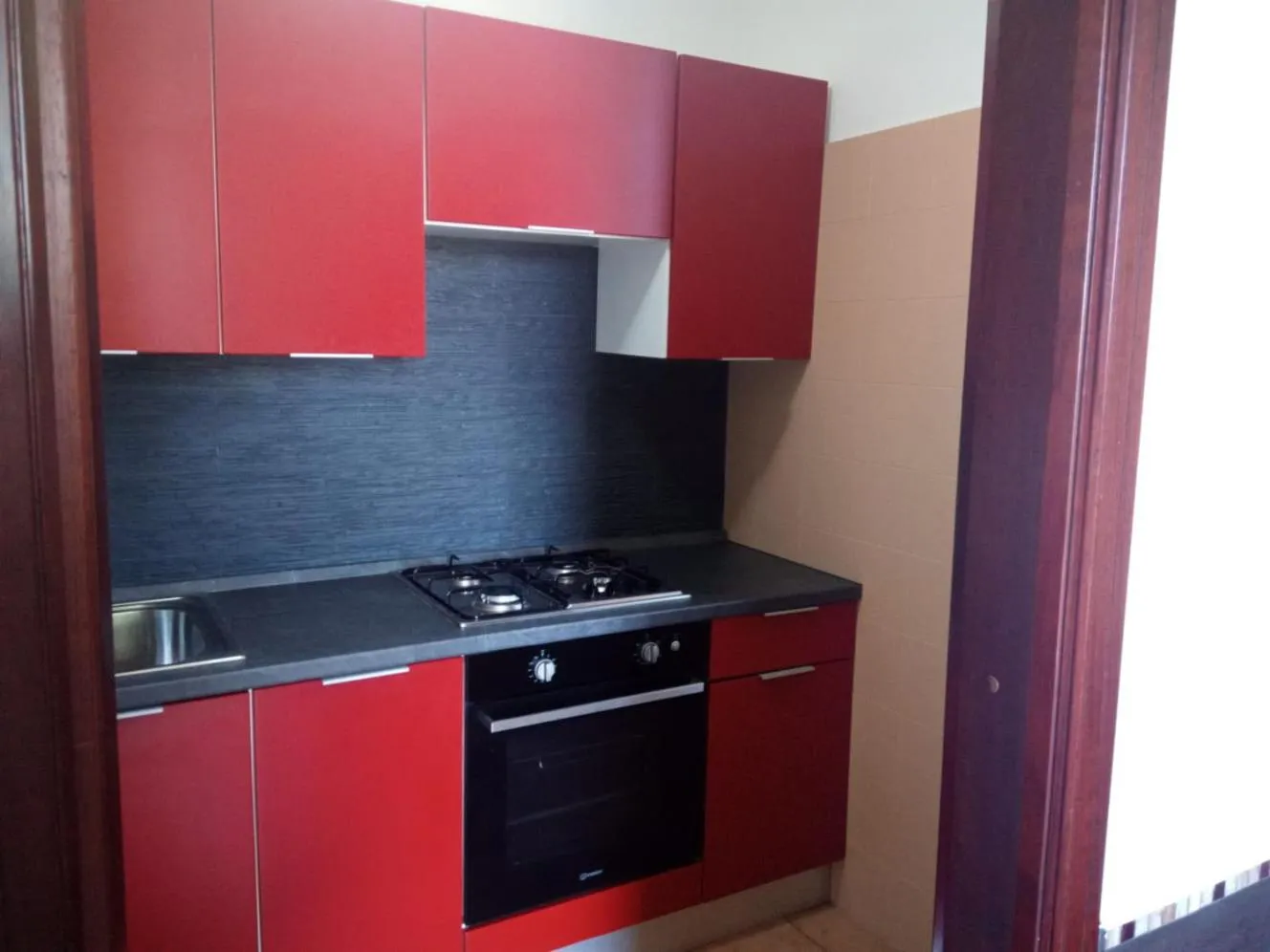 Communal kitchen in Stanza in Villa con giardino vista mare