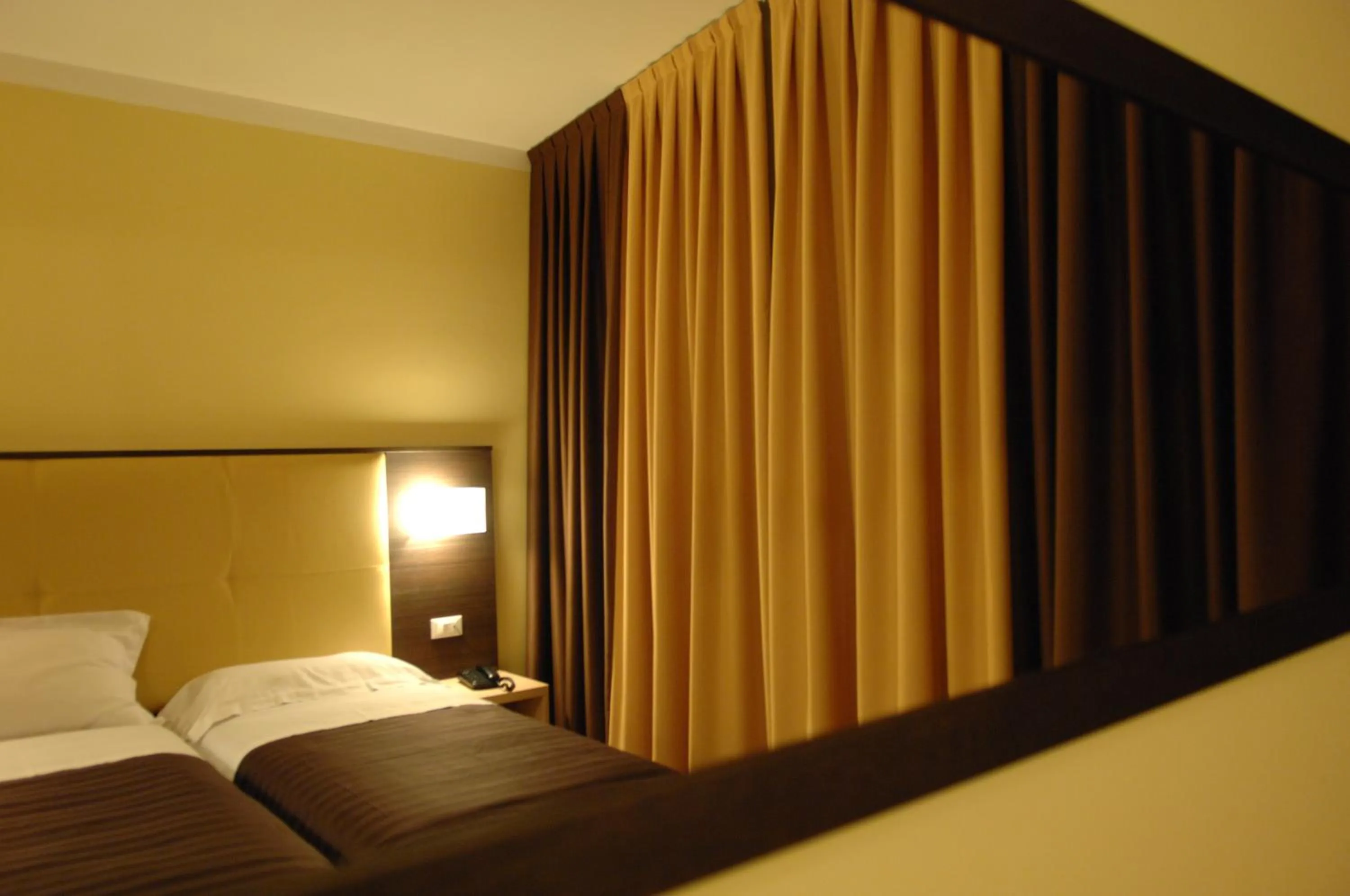 Bed in Hotel Alverì