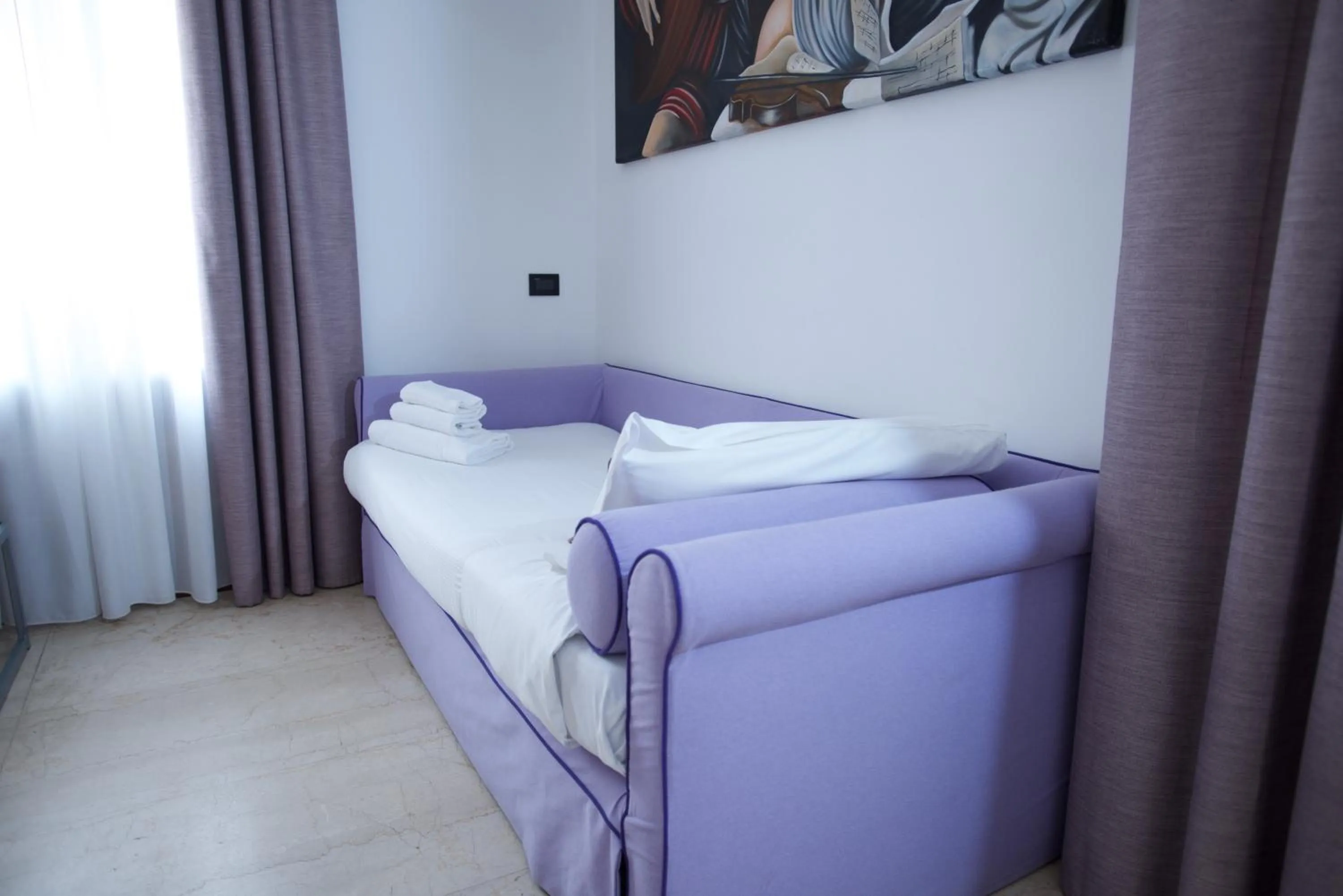 Bed in St. Peter' Six Rooms & Suites