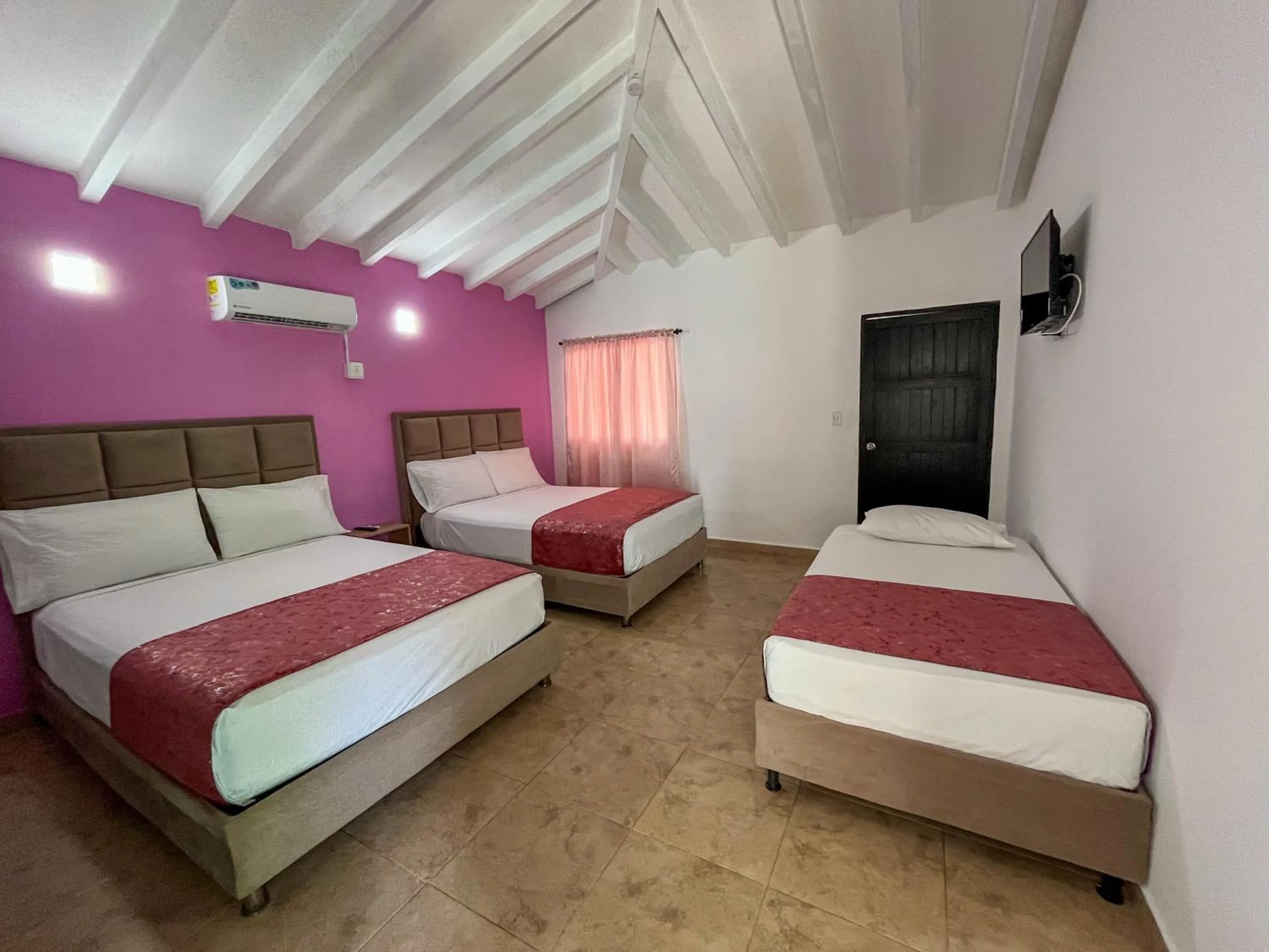 air conditioner, Bed in Hotel Los Veleros Santa Marta