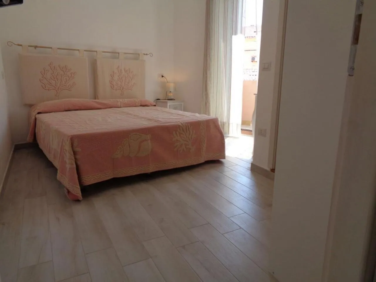 Bed in Sardinia-holiday Spargi Suite & Rooms