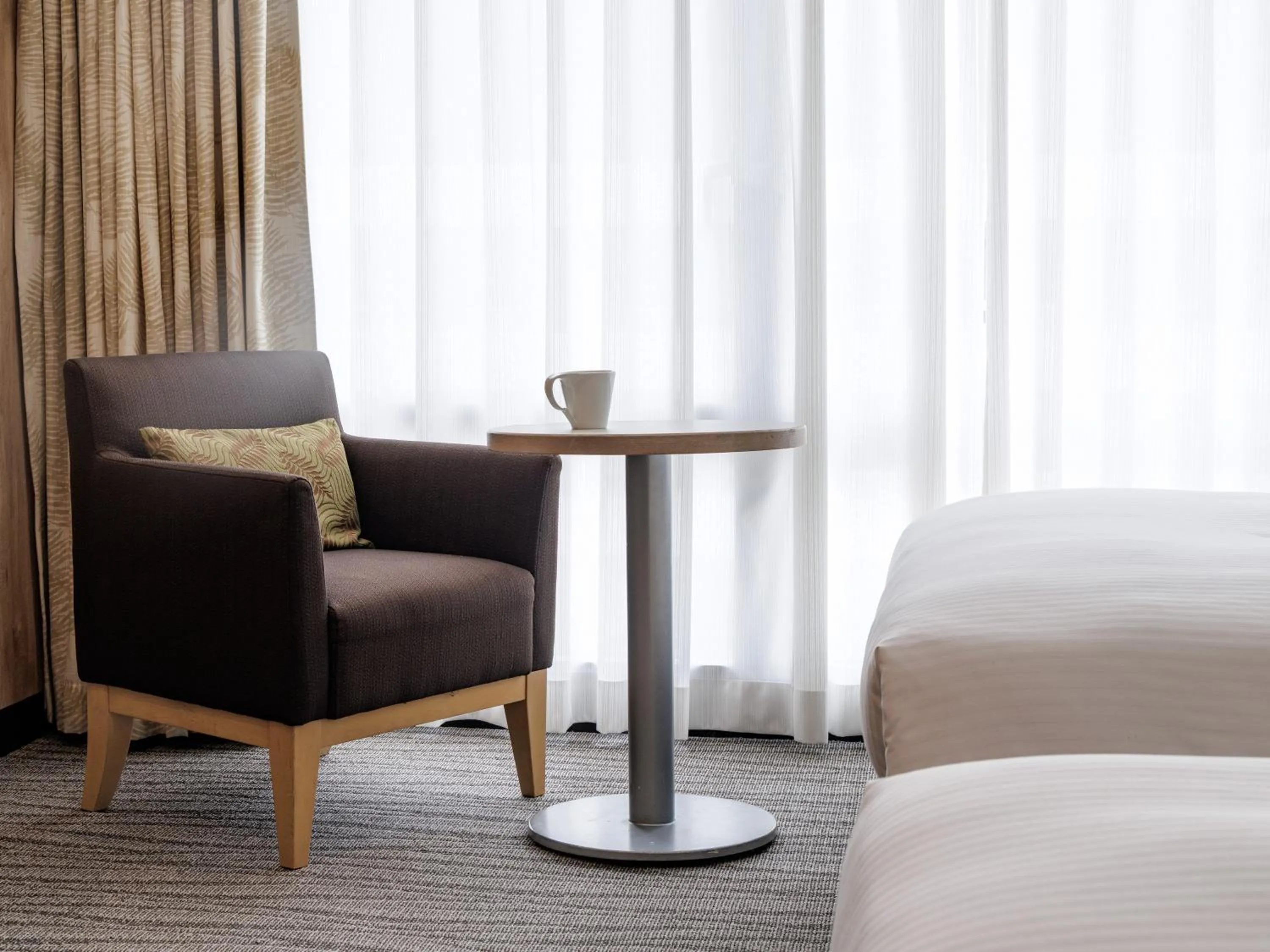 Photo of the whole room, Bed in Nishitetsu Resort Inn Naha