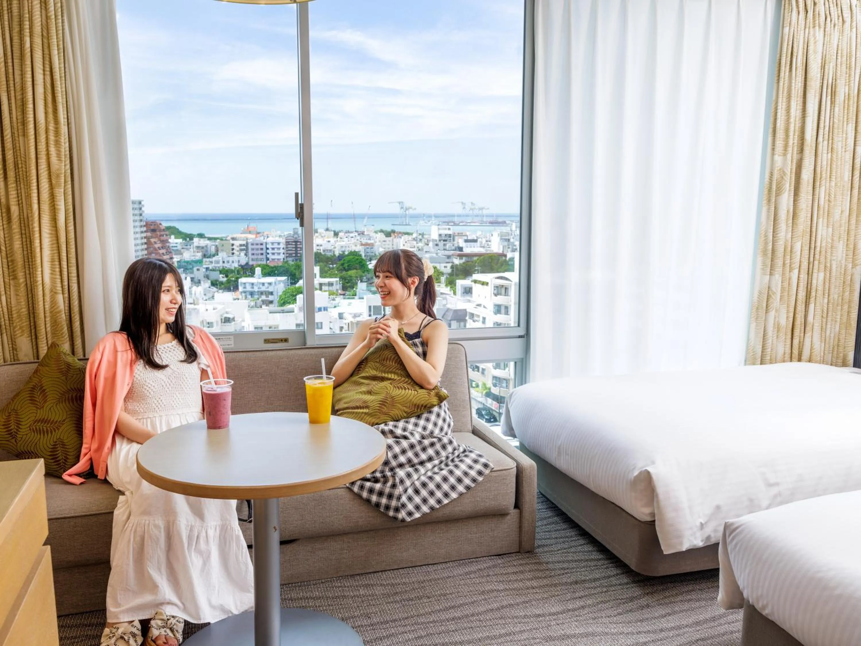 People, Bed in Nishitetsu Resort Inn Naha