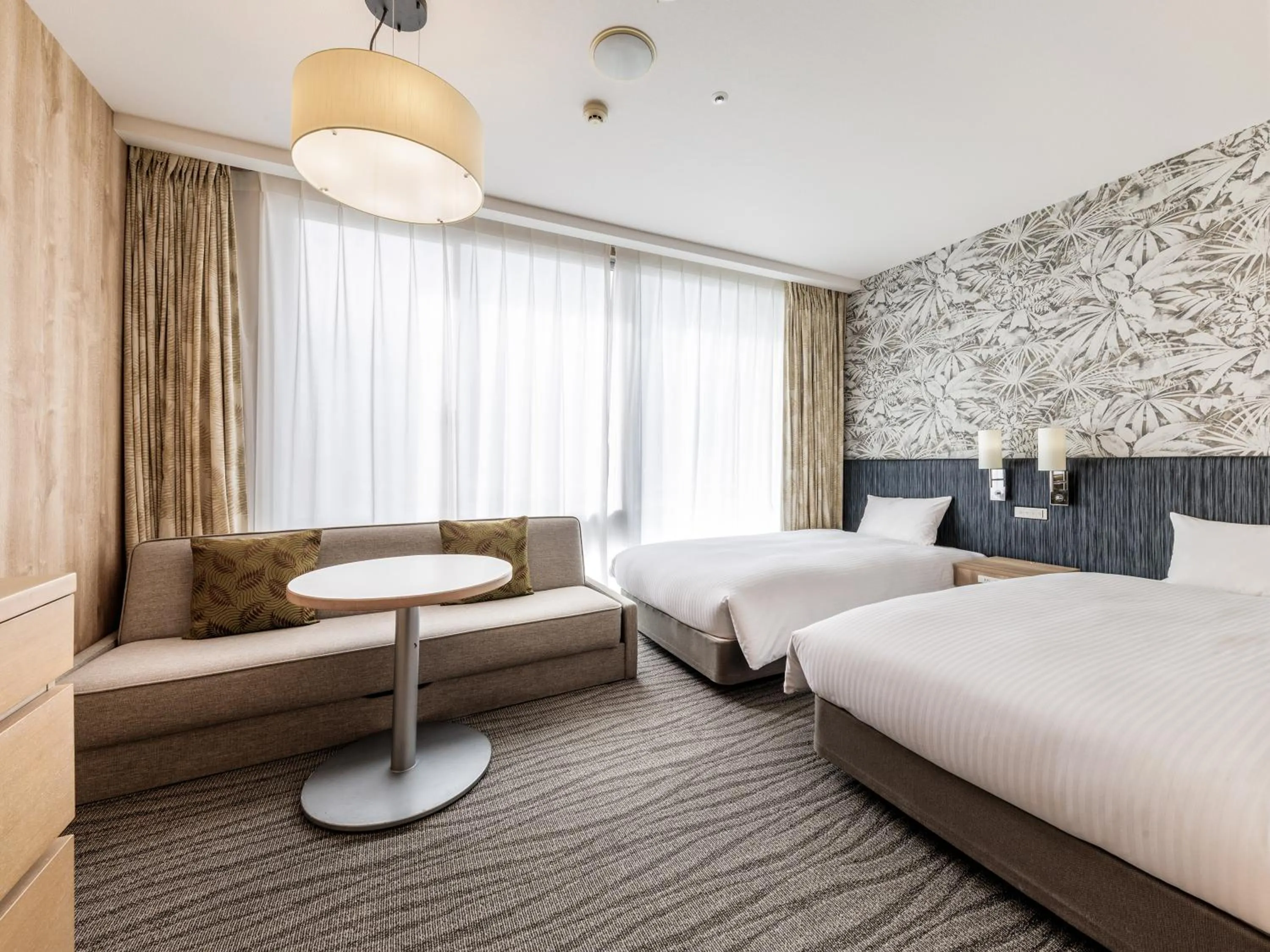 Photo of the whole room, Bed in Nishitetsu Resort Inn Naha