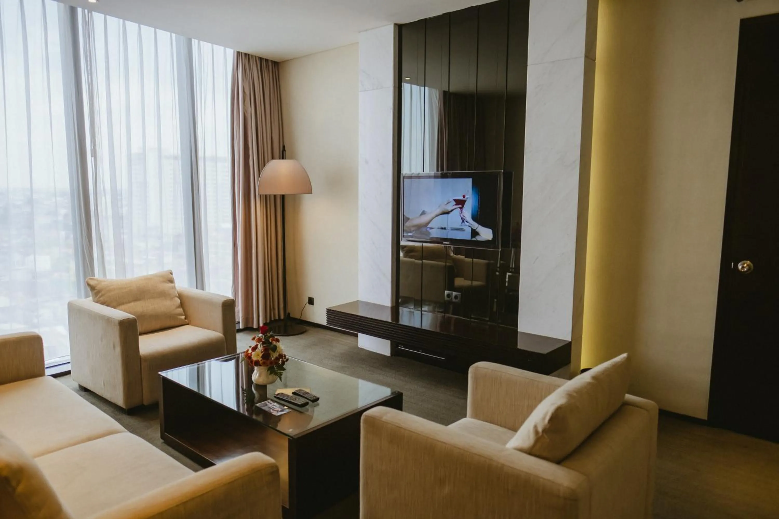 Living room in PO Hotel Semarang