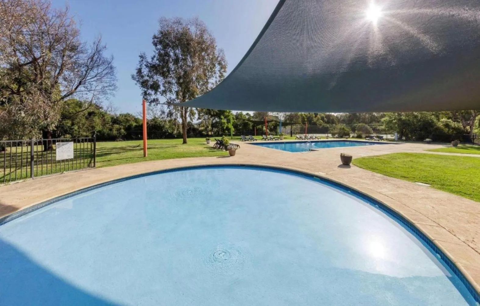 Swimming pool in The Nature Resort Villas Ramada Resort