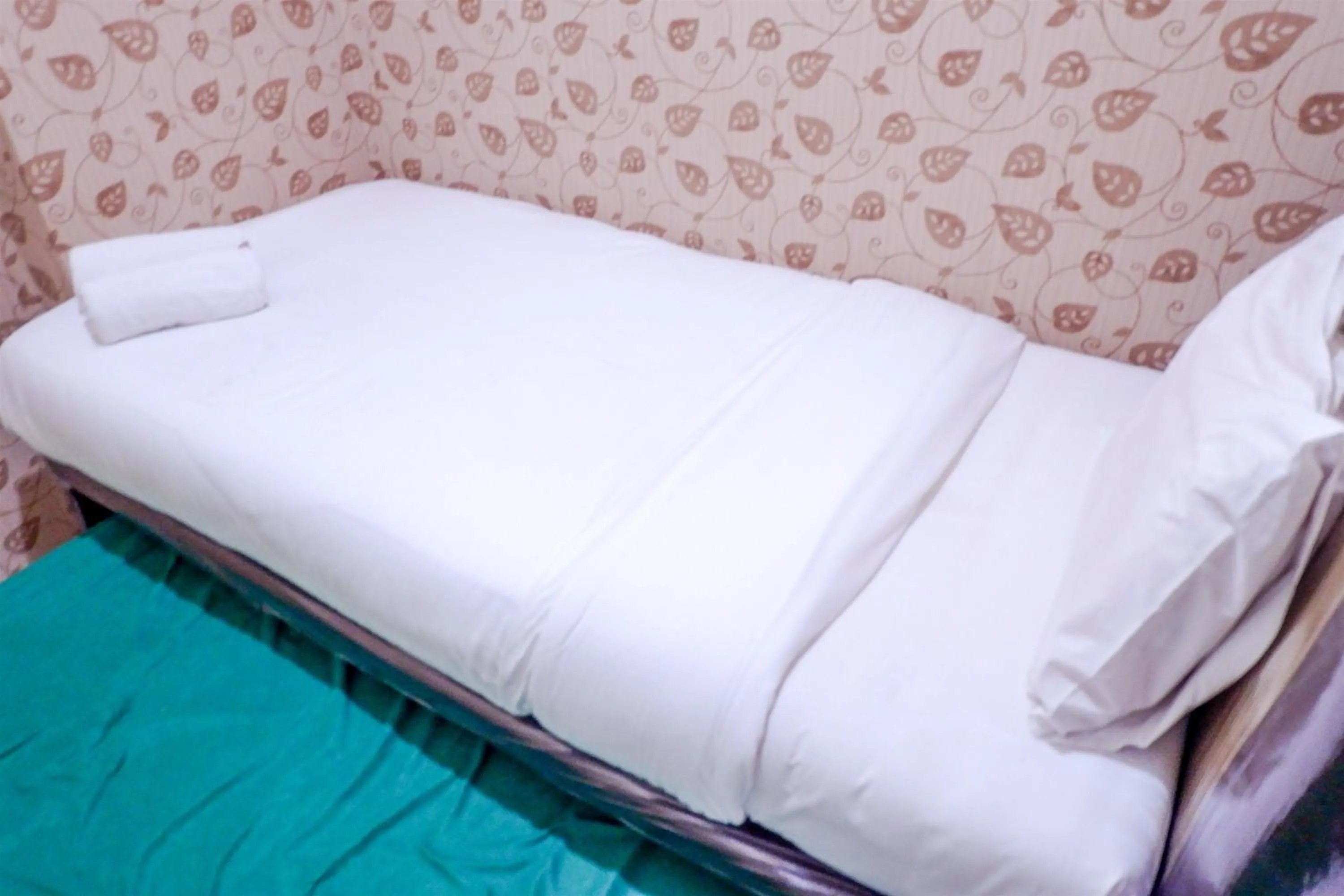 Bed in Strategic 2BR Menteng Square Apartment By Travelio