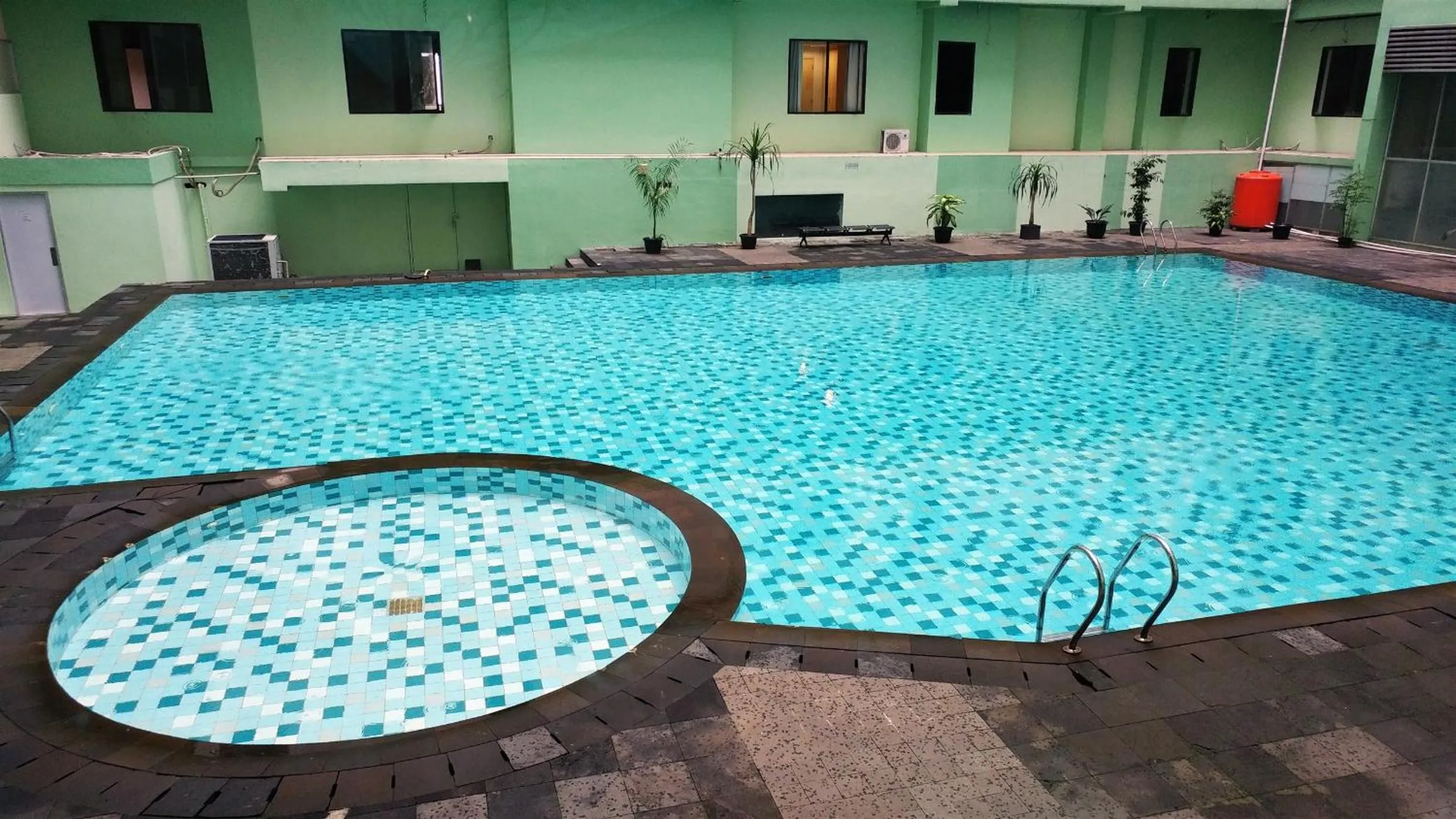 Swimming pool in Strategic 2BR Menteng Square Apartment By Travelio