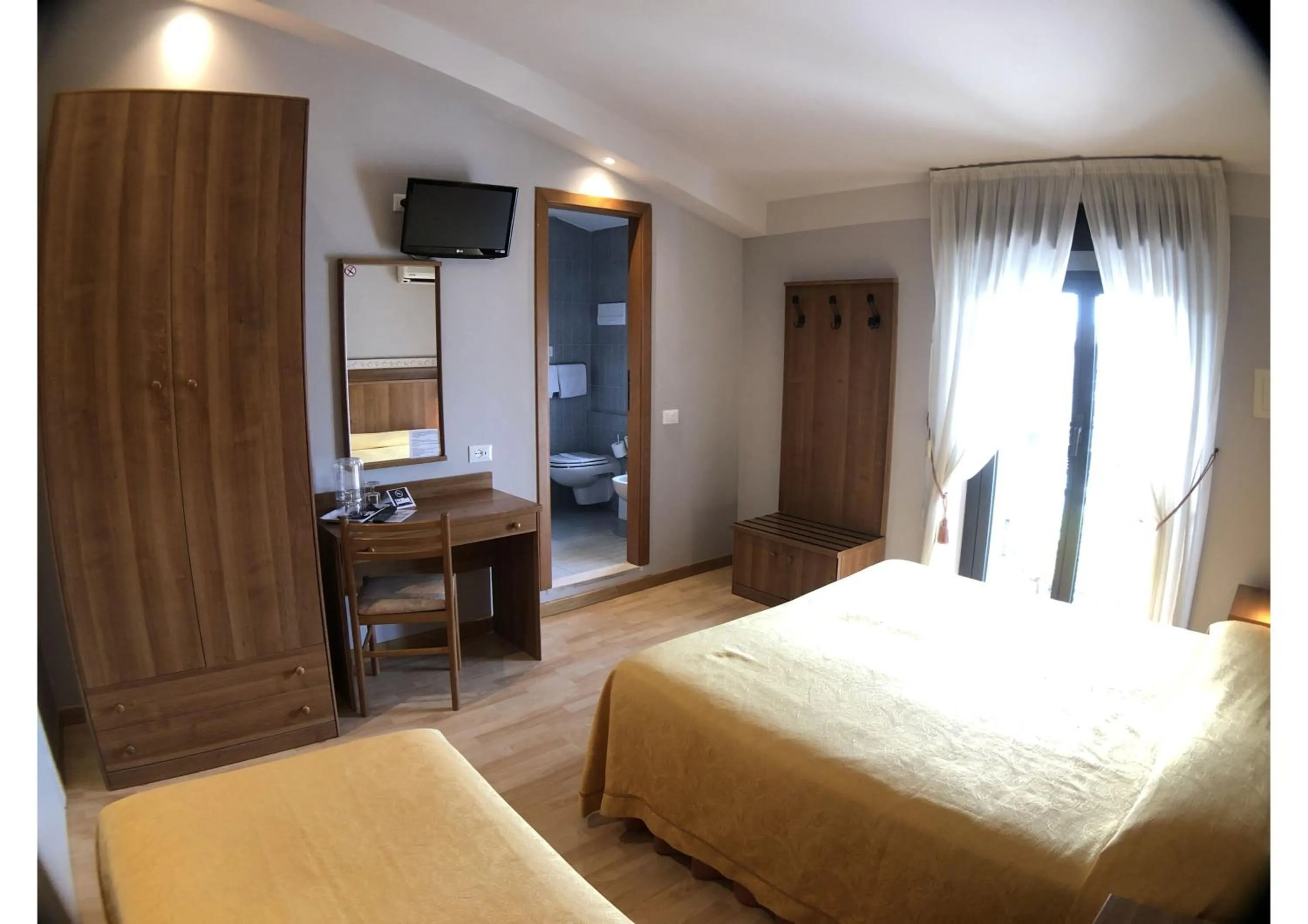 Bed in Hotel La Bussola