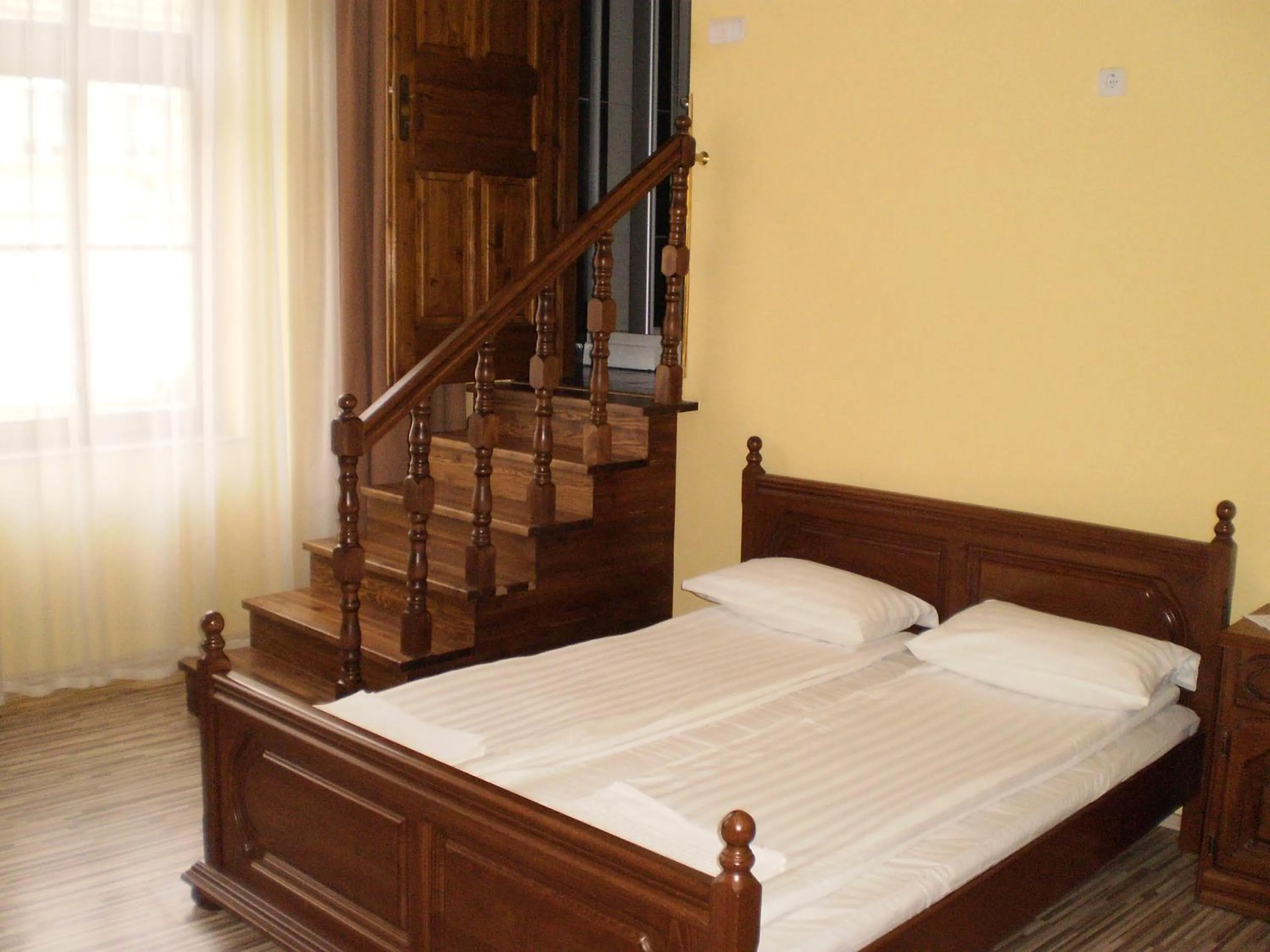 Bed in Mosoly Apartman