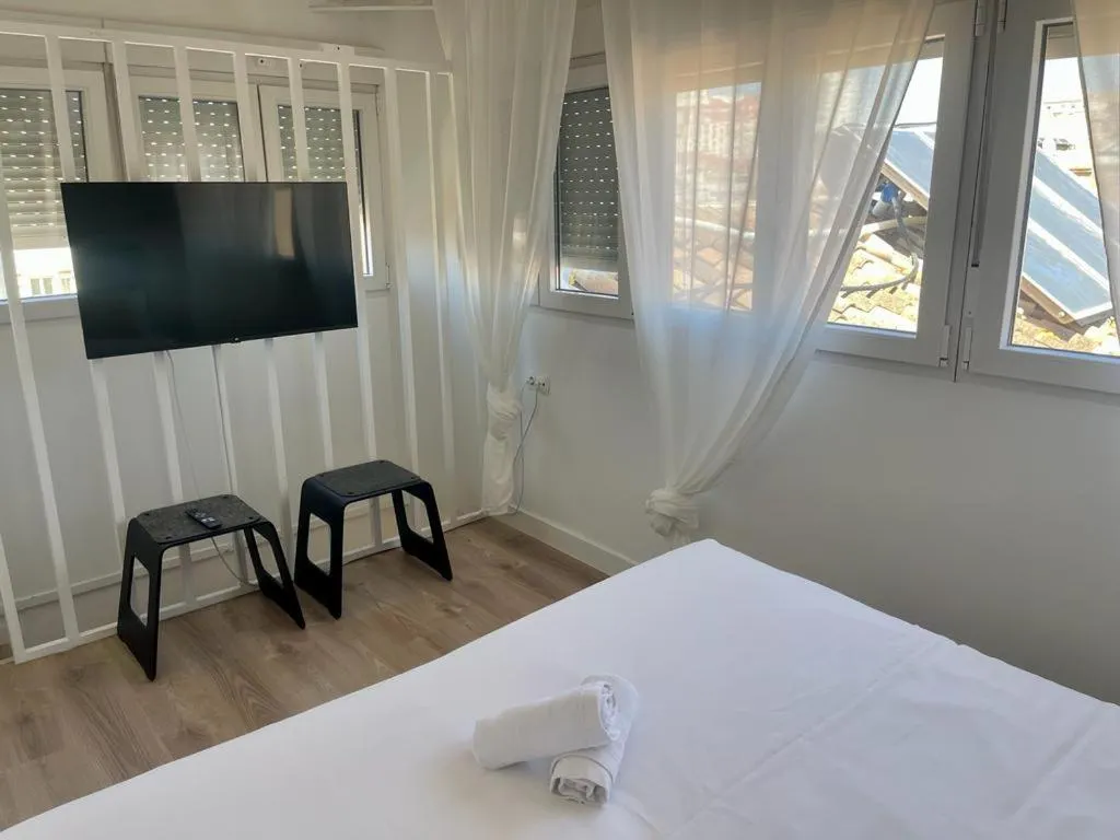 Bed in Malaga City Suites