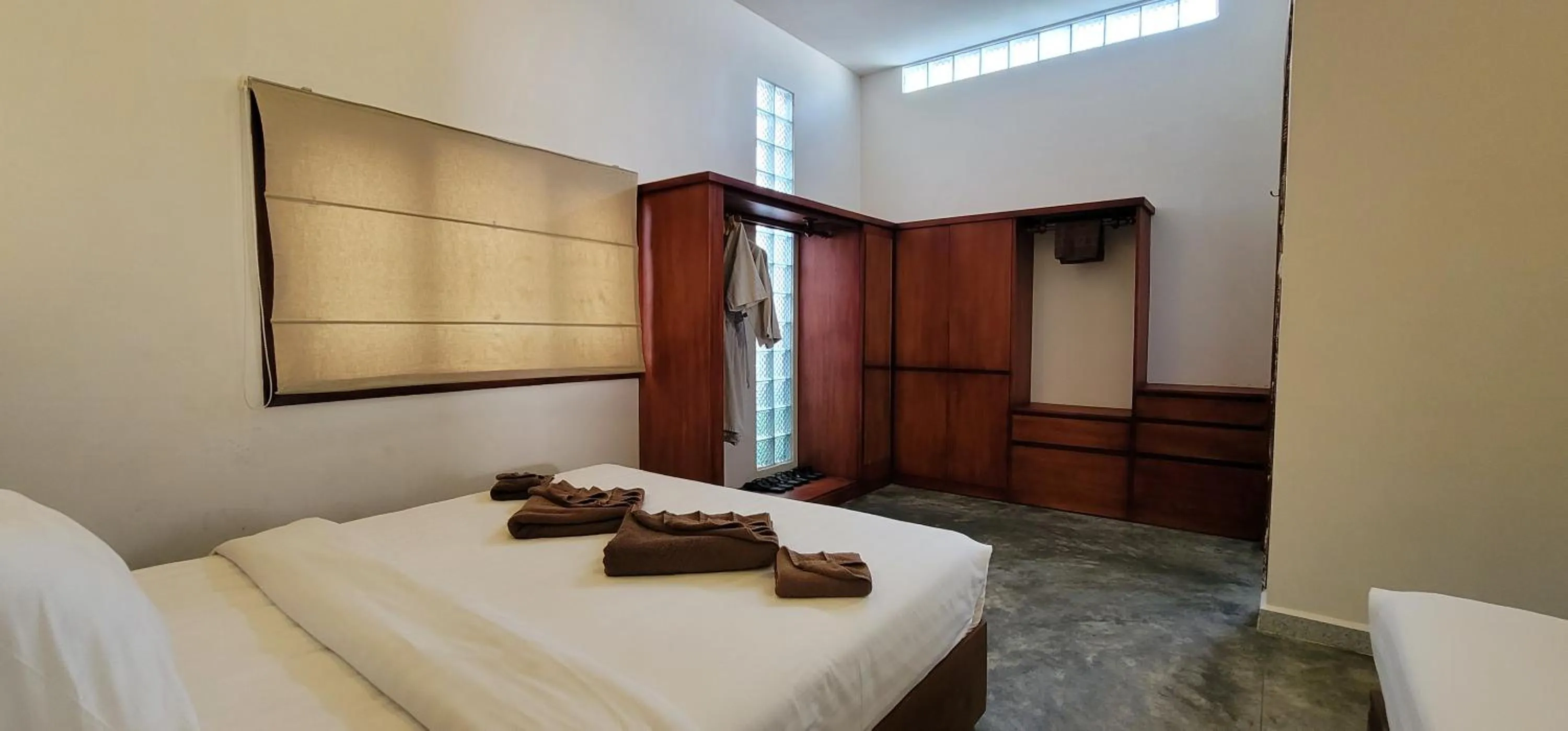 wardrobe, Bed in Sarina Hotel & Villa