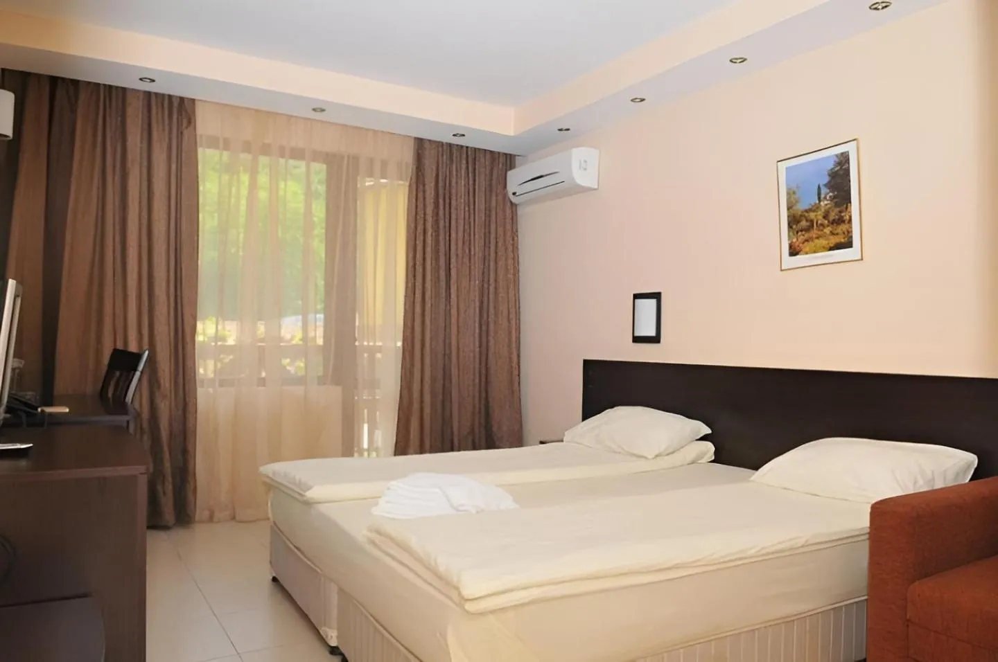 Bed in Family Hotel Delta