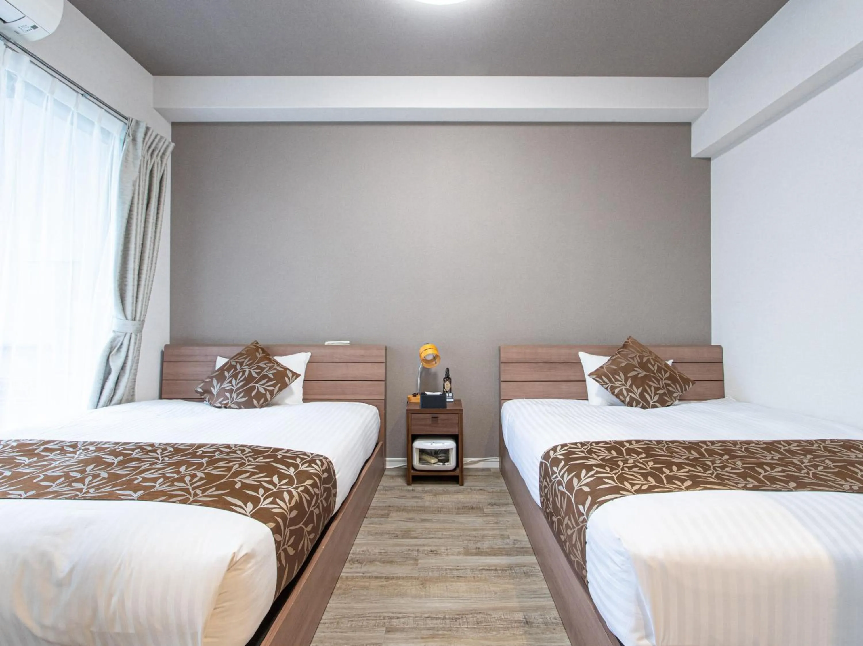 Bed in Dream Inn Hakata
