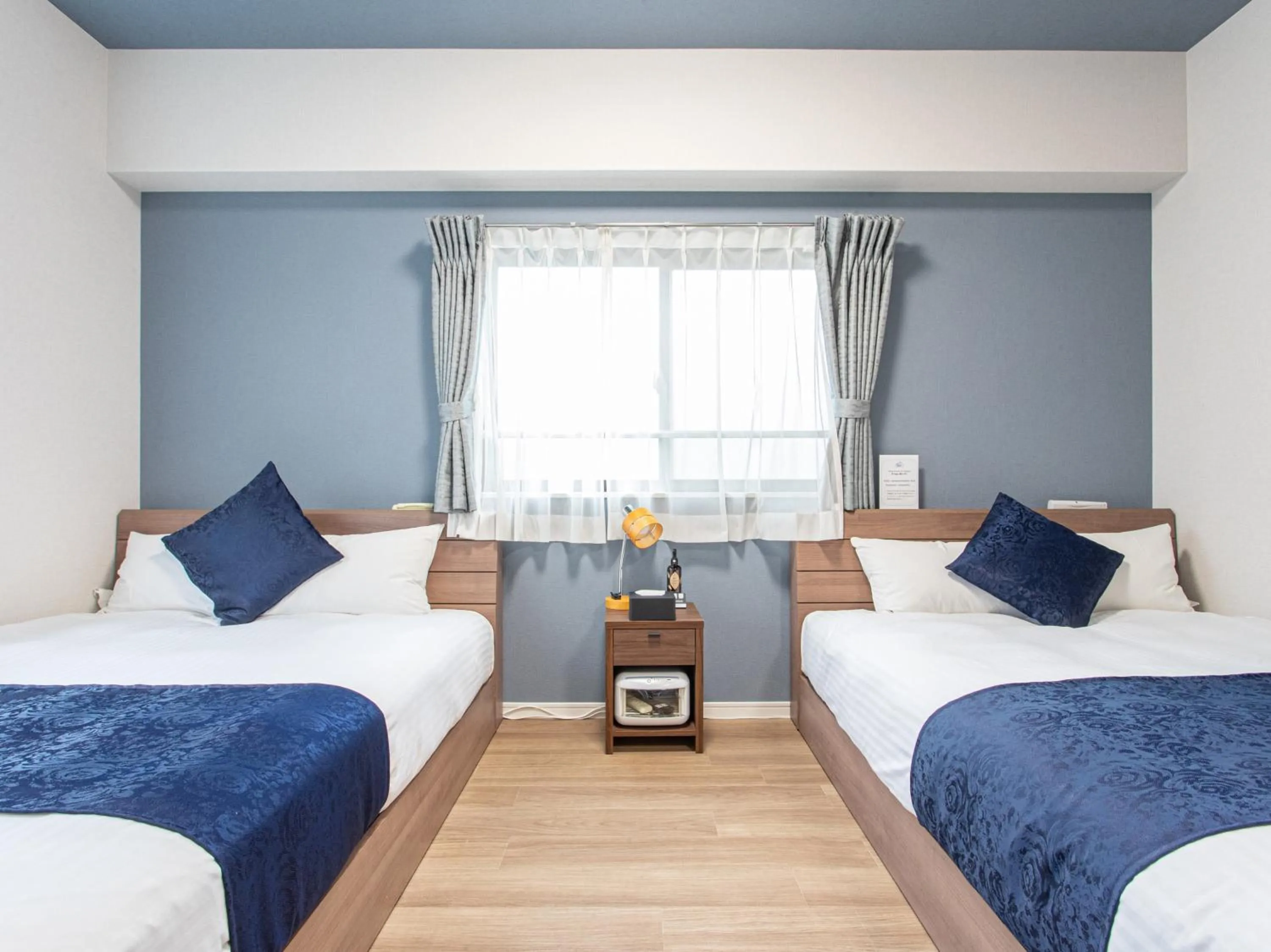 Bed in Dream Inn Hakata