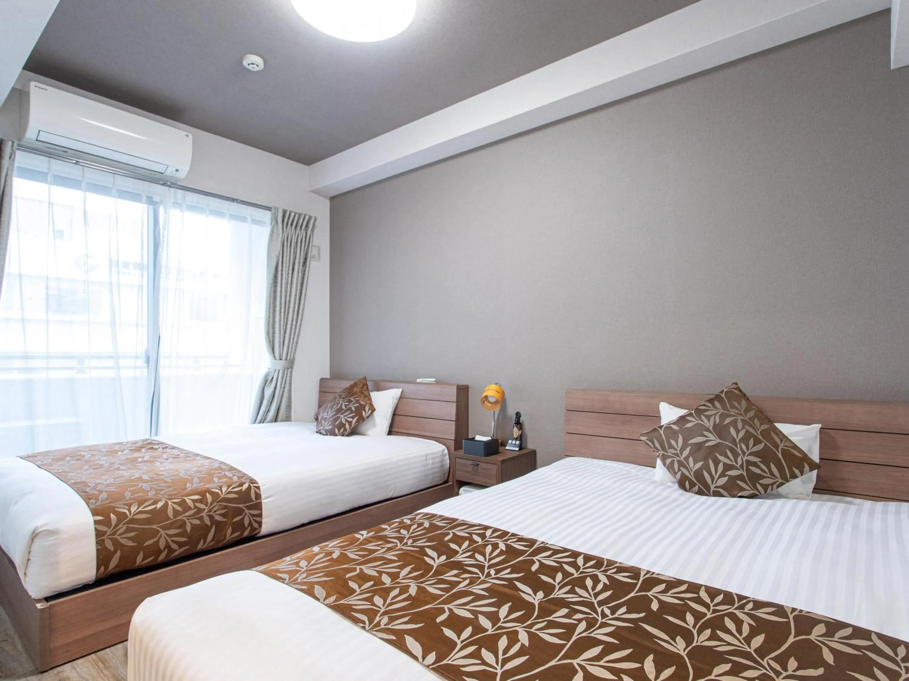 Bed in Dream Inn Hakata