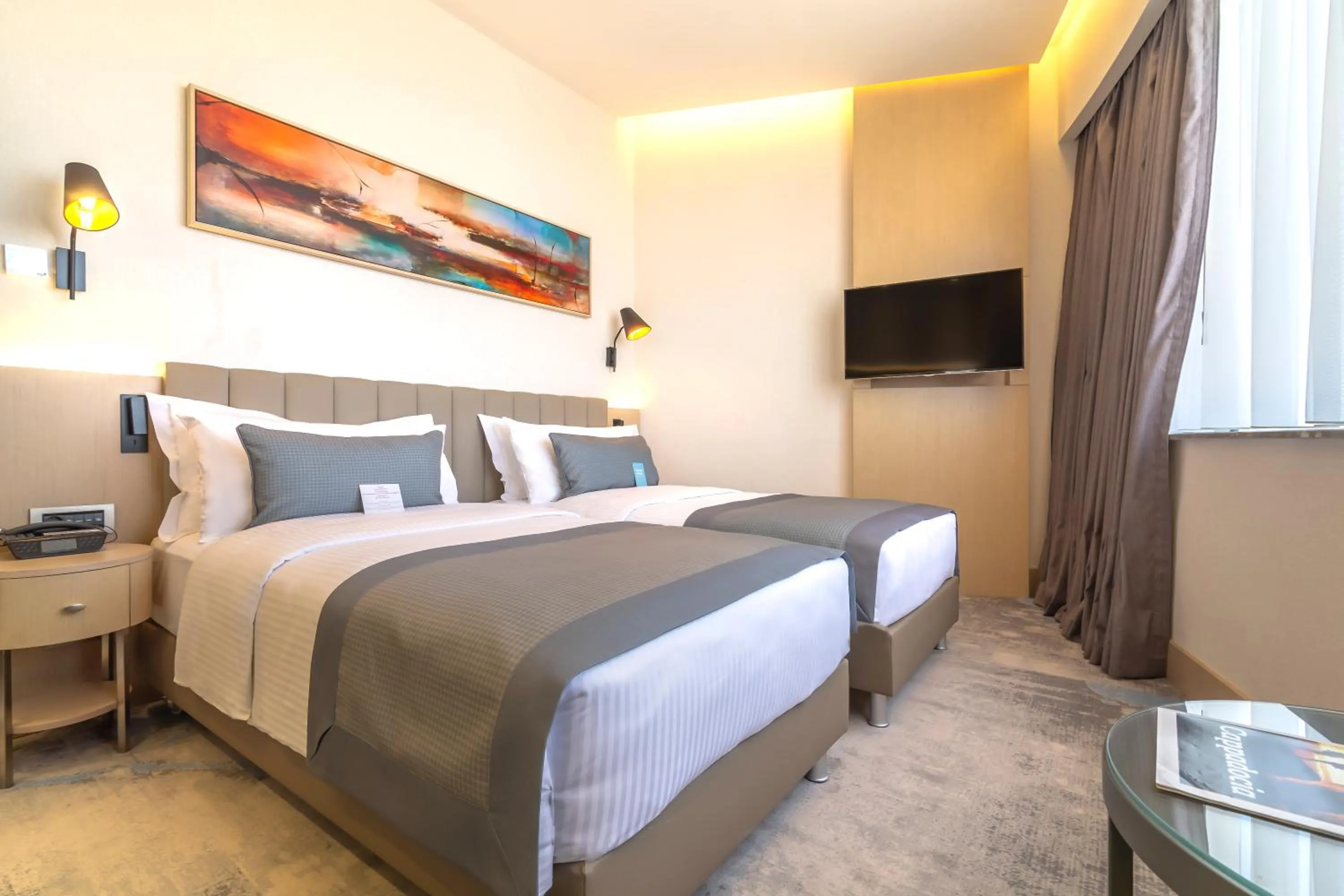 Photo of the whole room, Bed in Crowne Plaza Cappadocia - Nevsehir by IHG