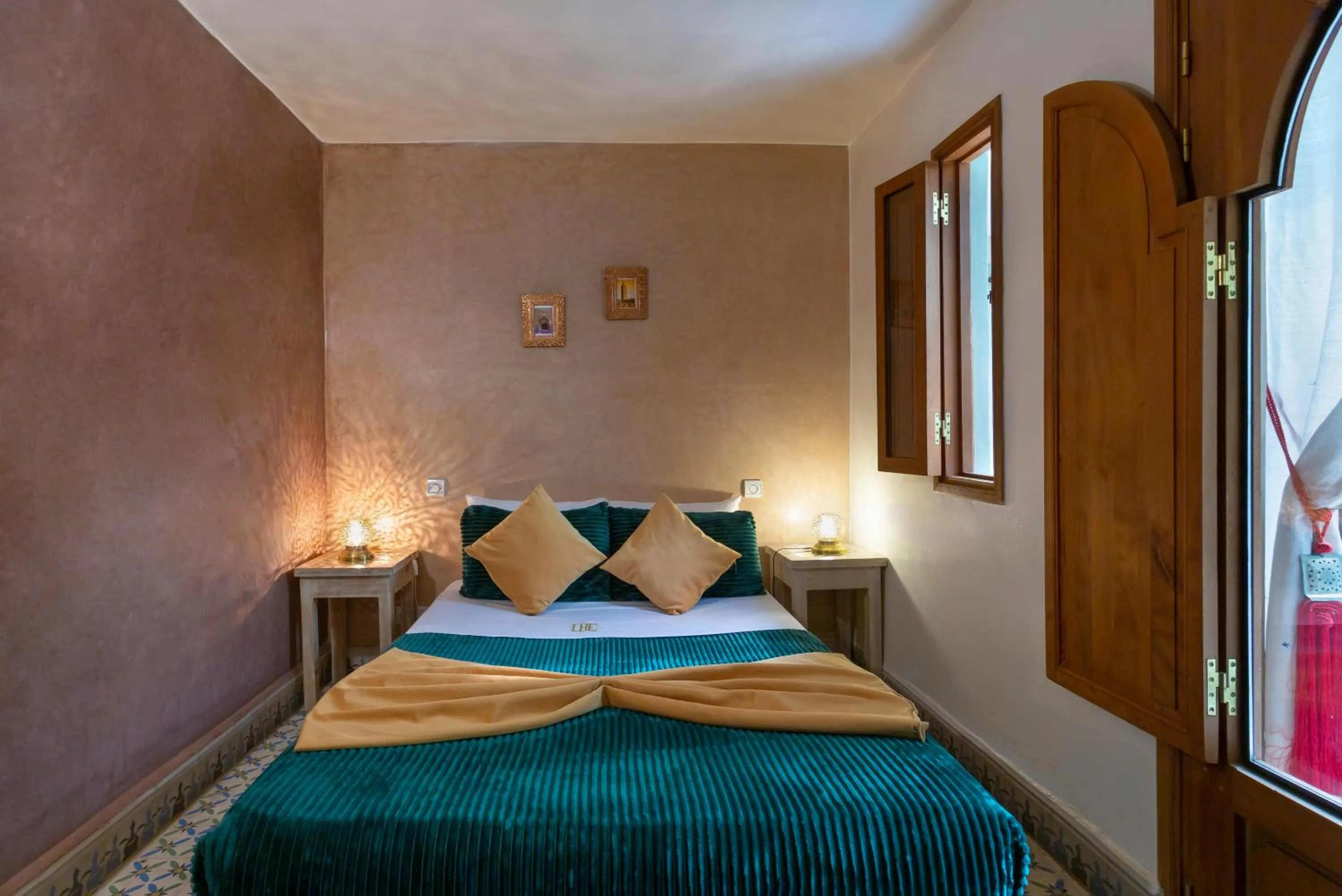 Bed in Riad l'Heure d'Eté