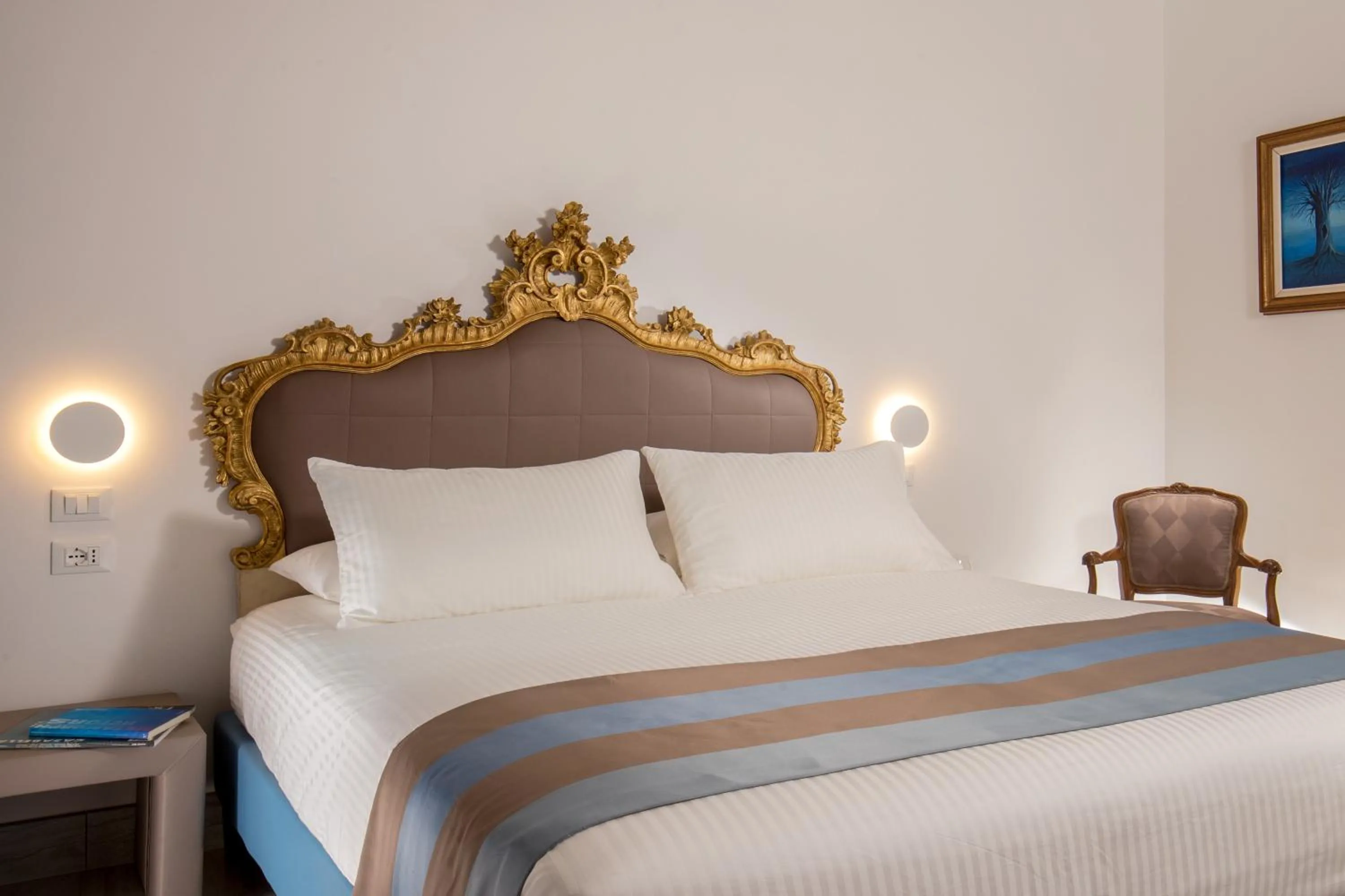 Bed in GCF Luxury Suites, Guest house