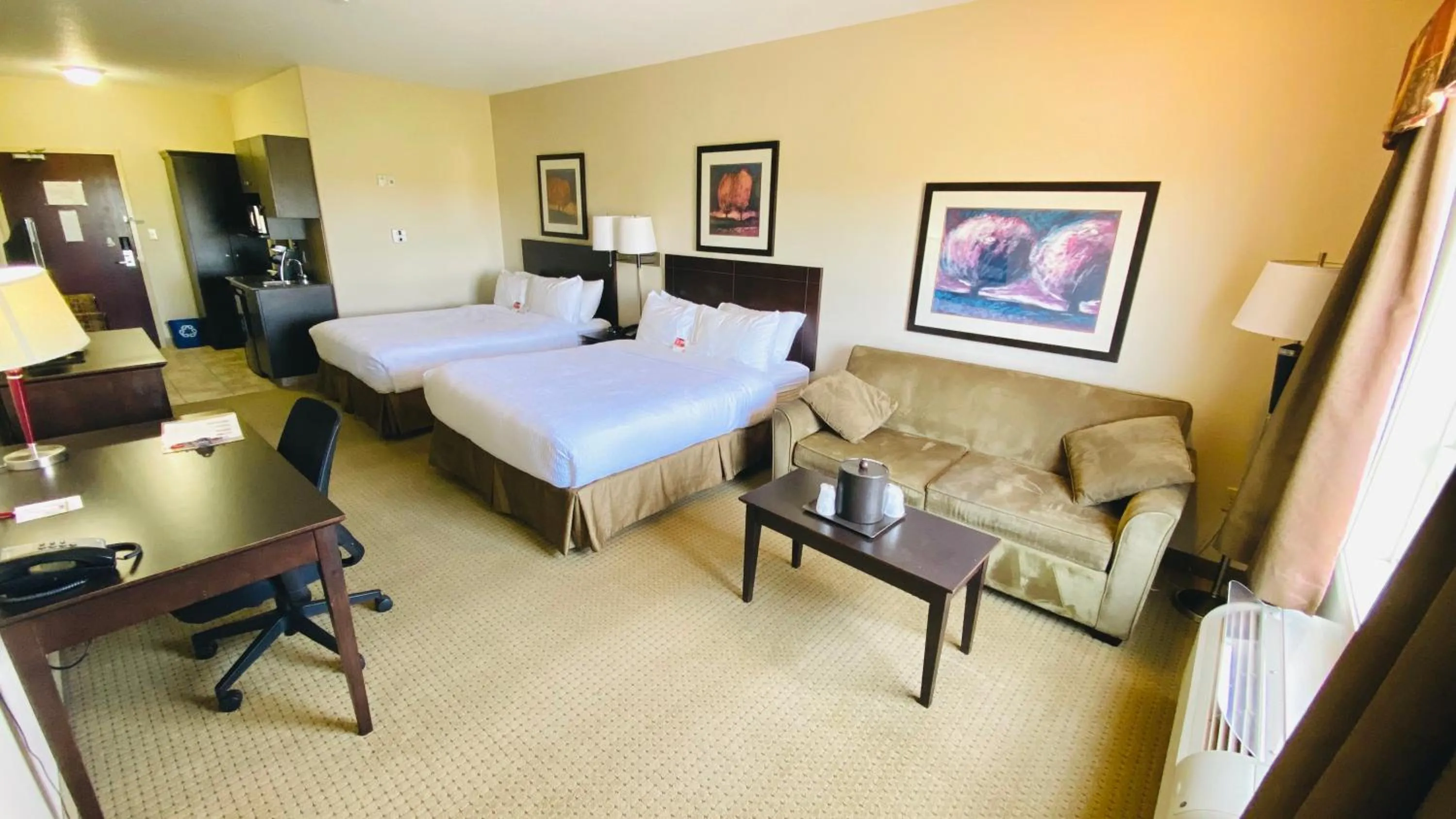 Seating area, Bed in Ramada by Wyndham Westlock