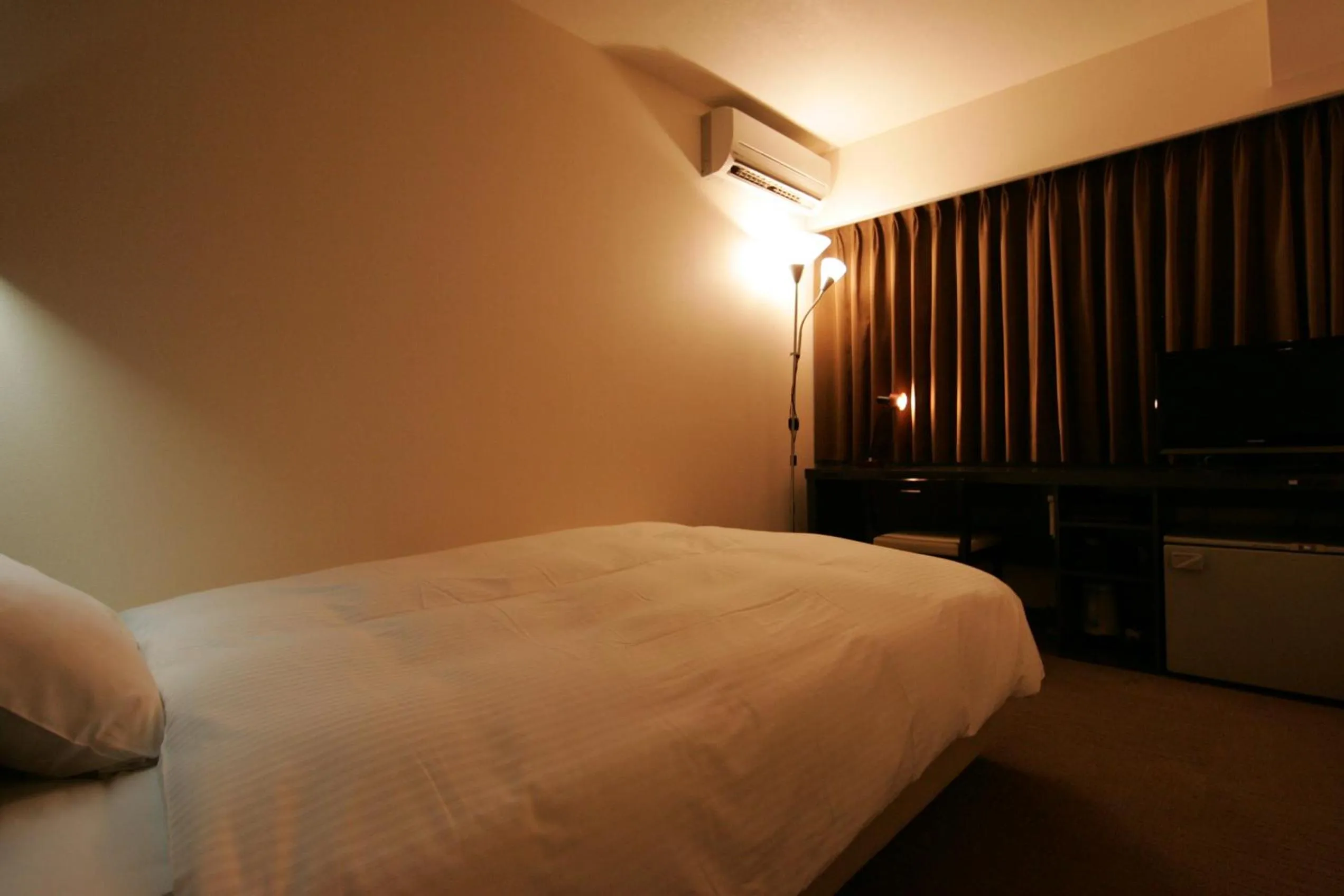 Photo of the whole room, Bed in Green Rich Hotel Nishitetsu Ohashi Ekimae