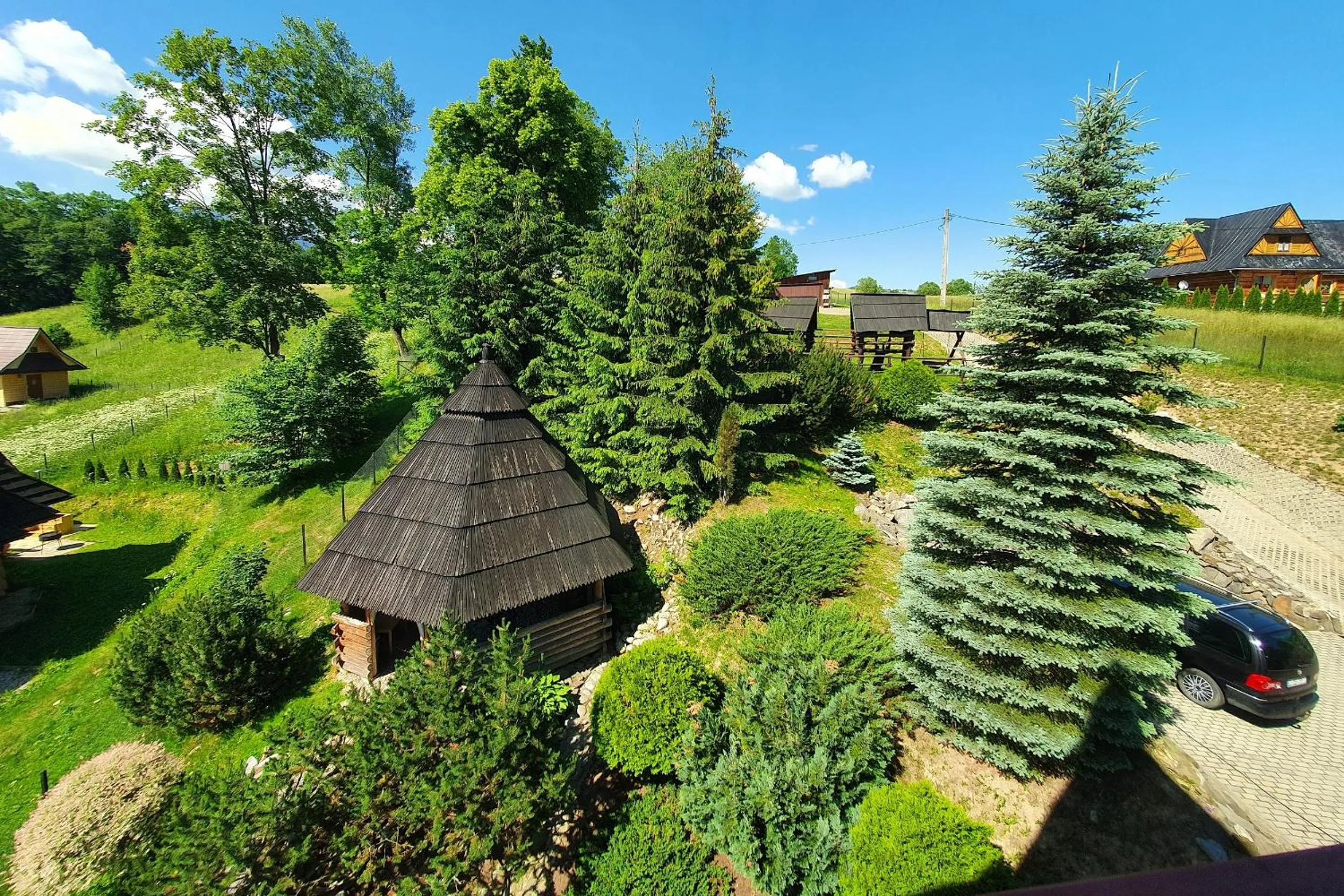 Garden view in Tatrzańska Rezydencja pod Brzyzkiem