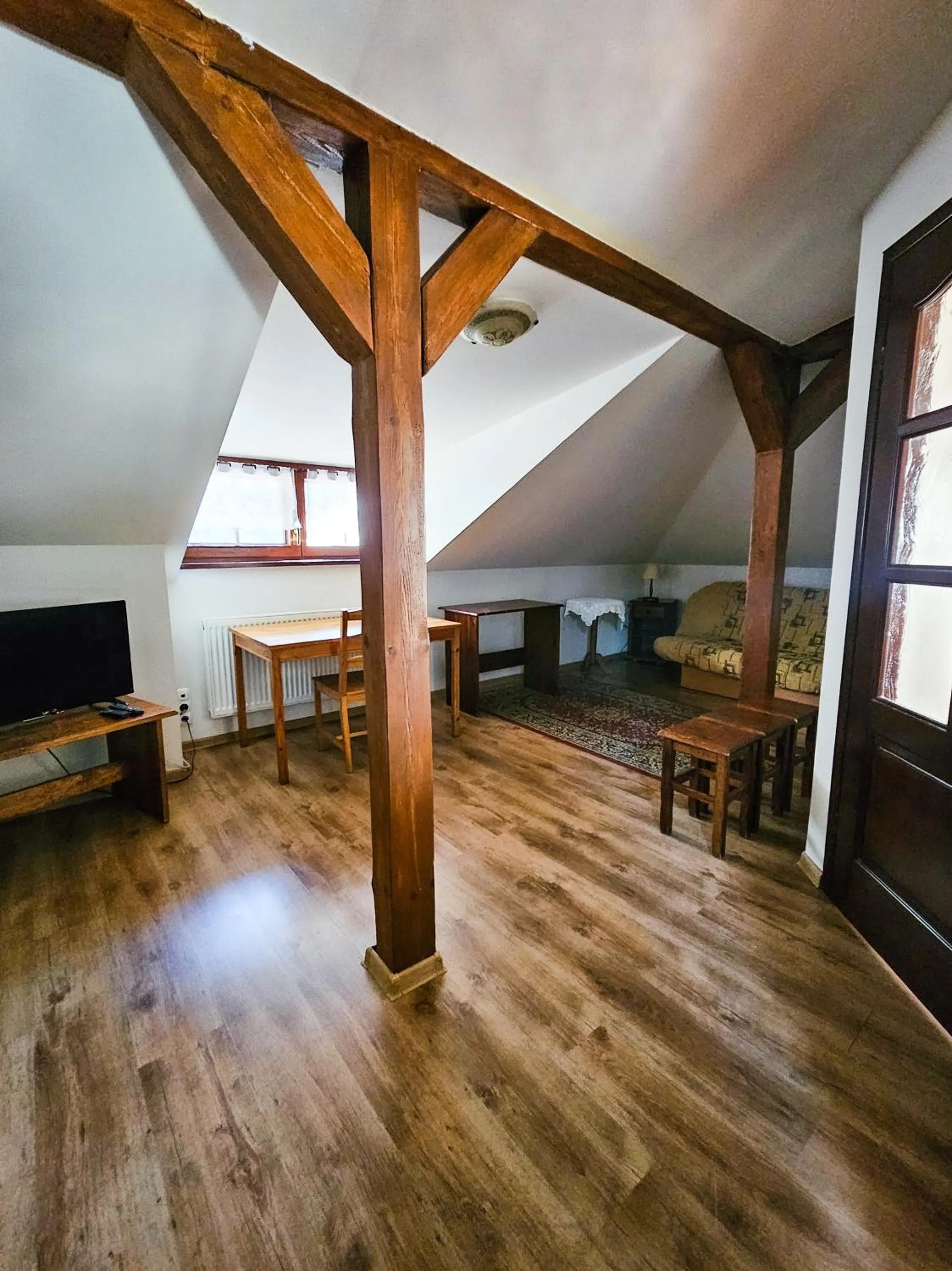 Communal lounge/ TV room in Gościniec Gryszczeniówka & SPA