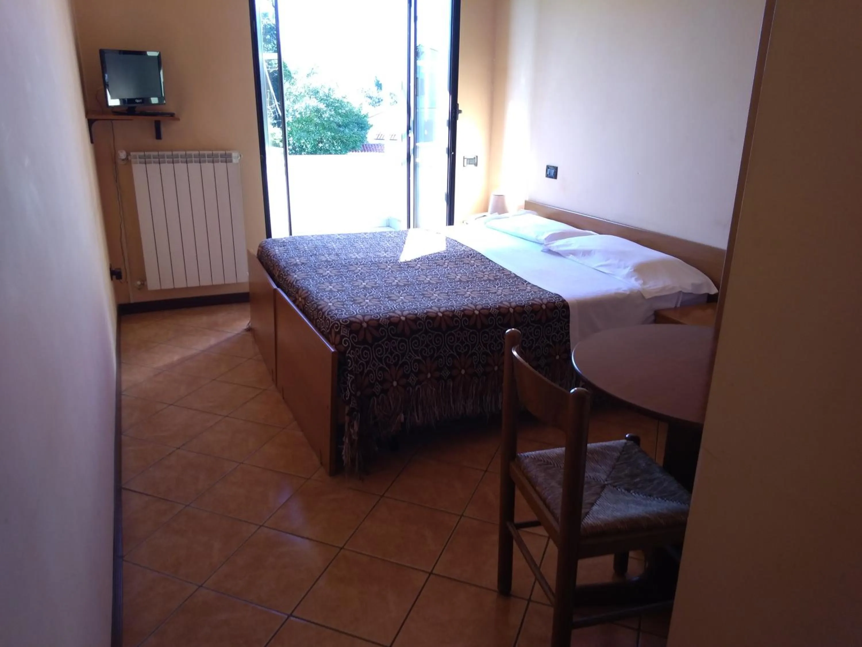 Bed in Hotel Sassacci