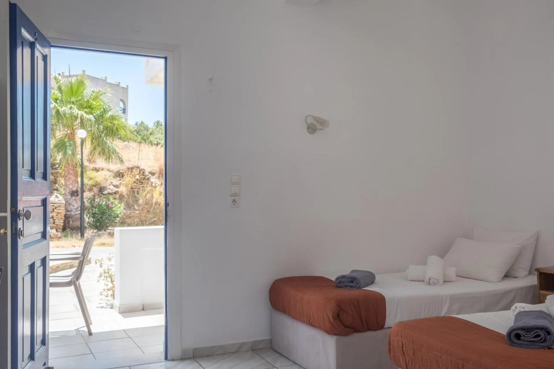 Bed in Paradise Apartments Studios