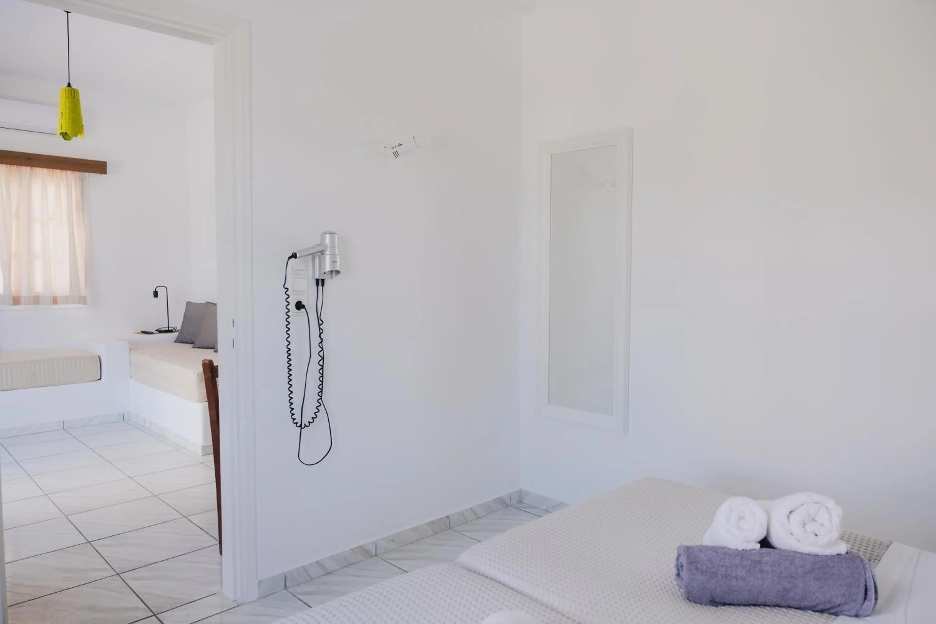 Bed in Paradise Apartments Studios