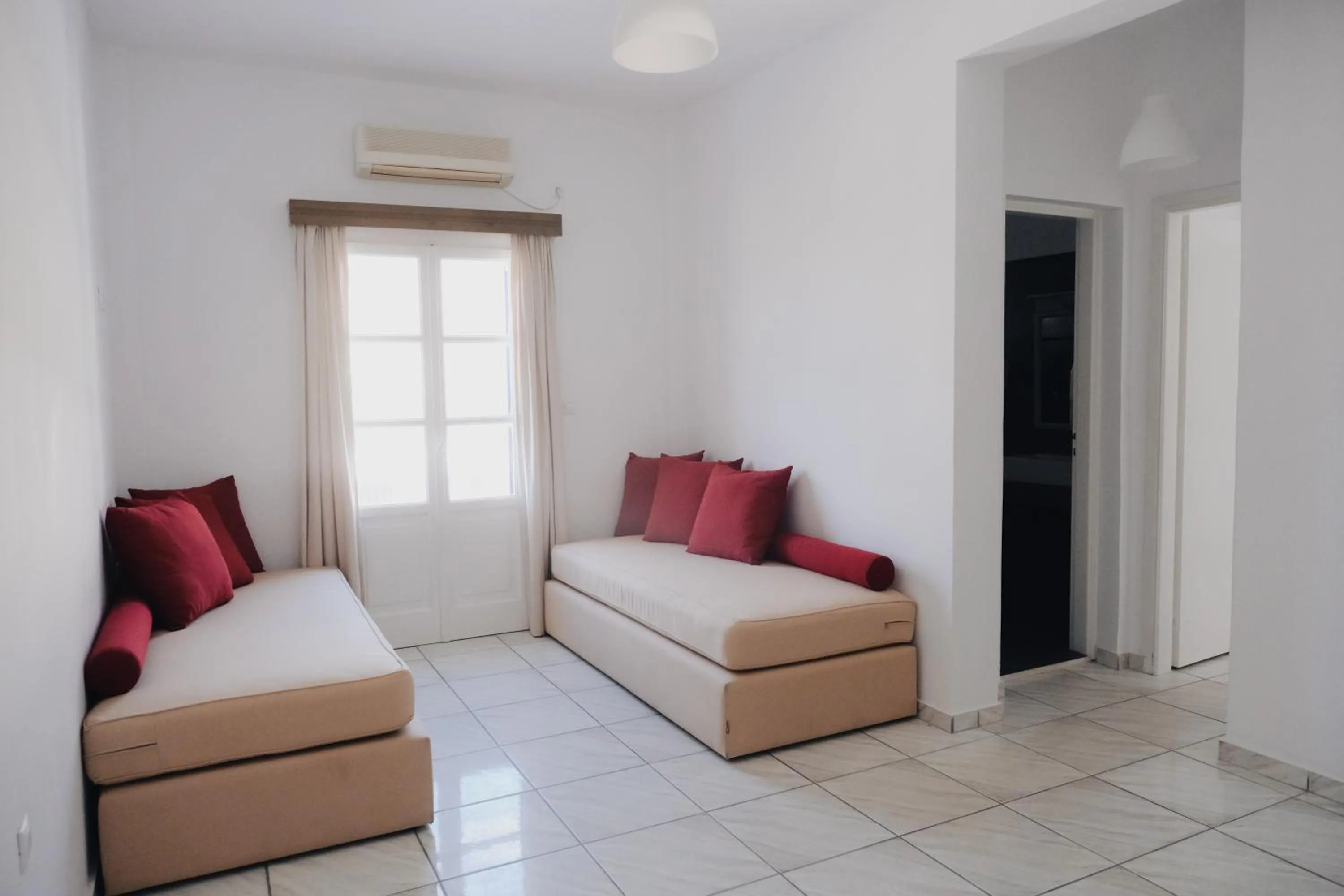 Bed in Paradise Apartments Studios