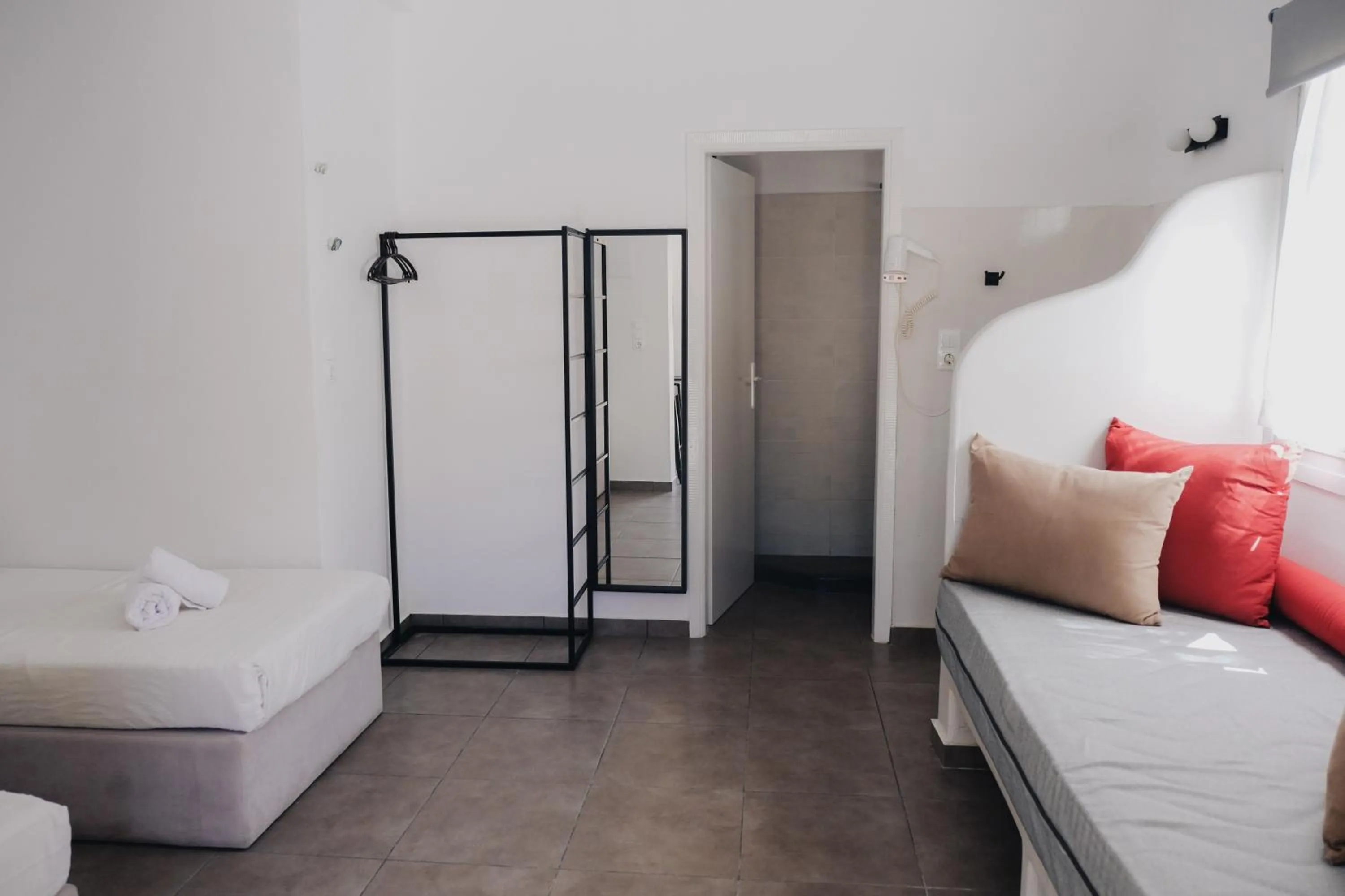 Bed in Paradise Apartments Studios