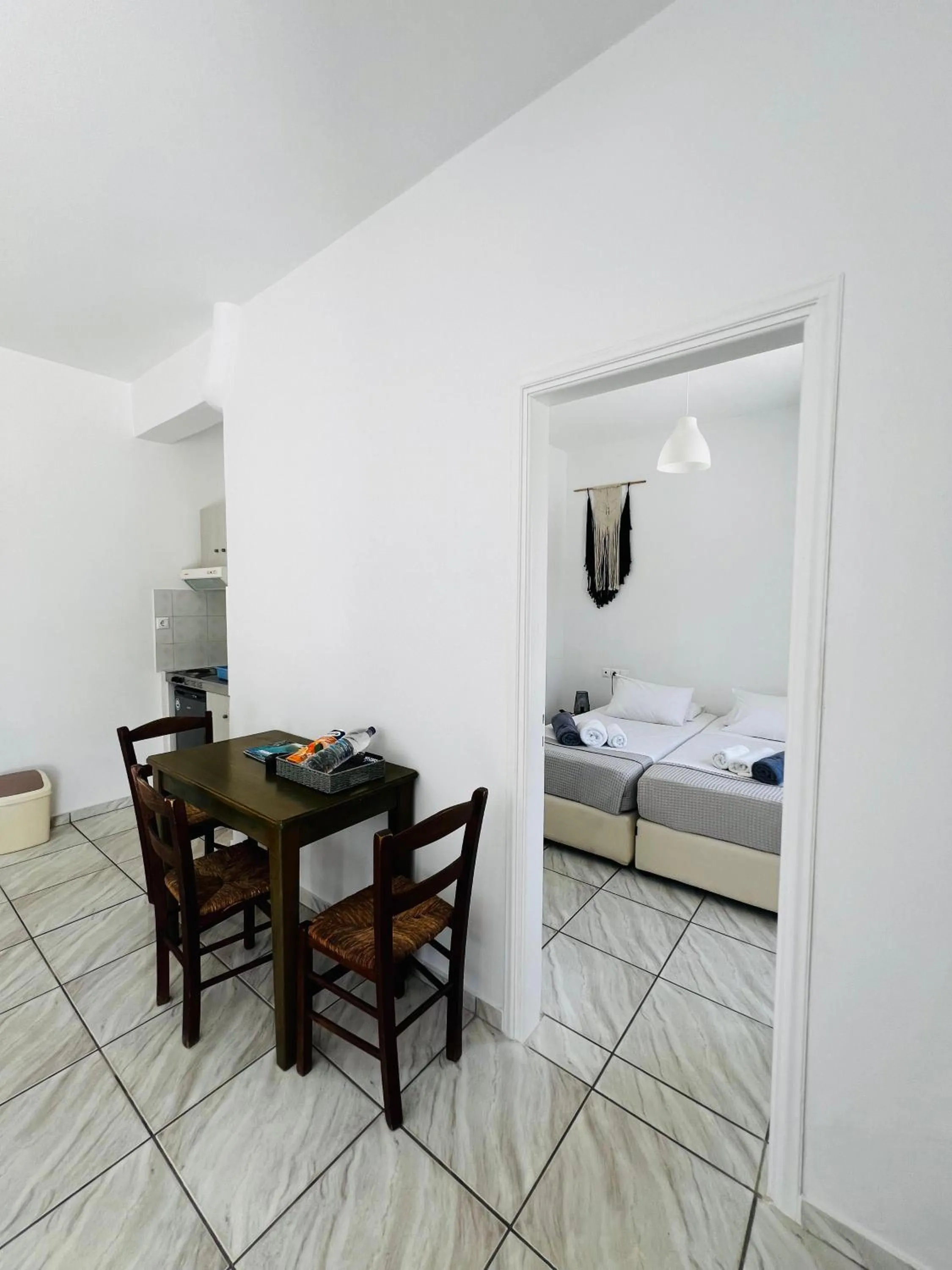 Bed in Paradise Apartments Studios