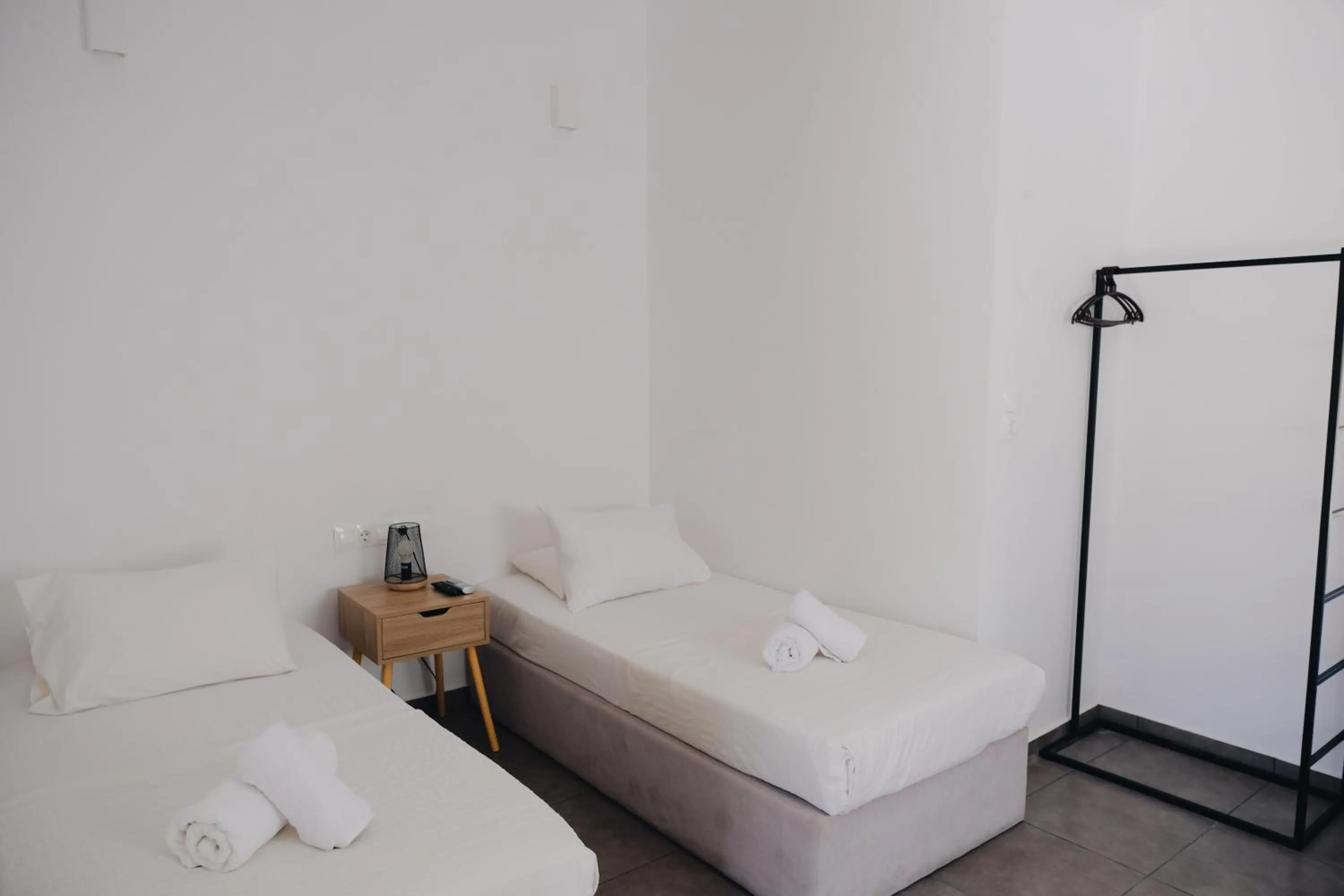 Bed in Paradise Apartments Studios