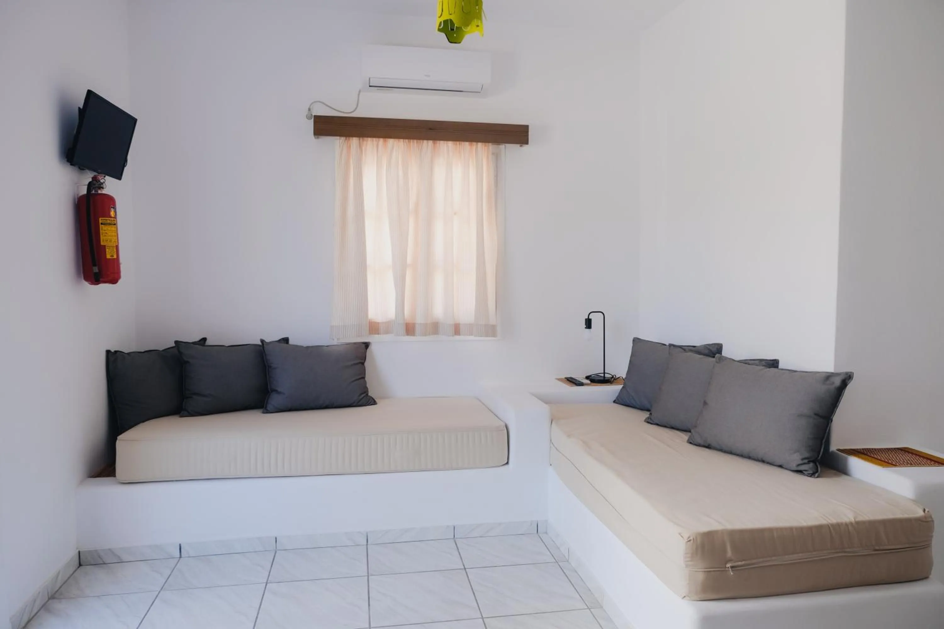 Bed in Paradise Apartments Studios