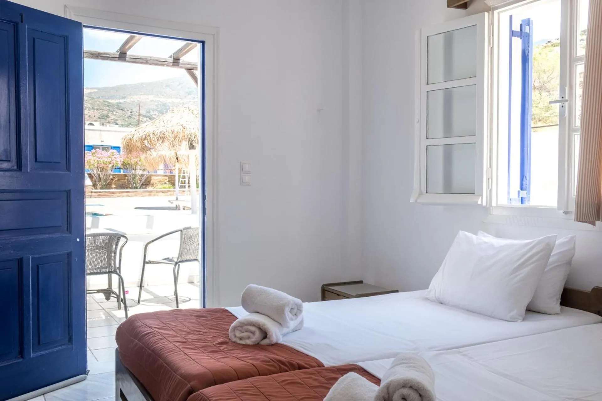 Bed in Paradise Apartments Studios