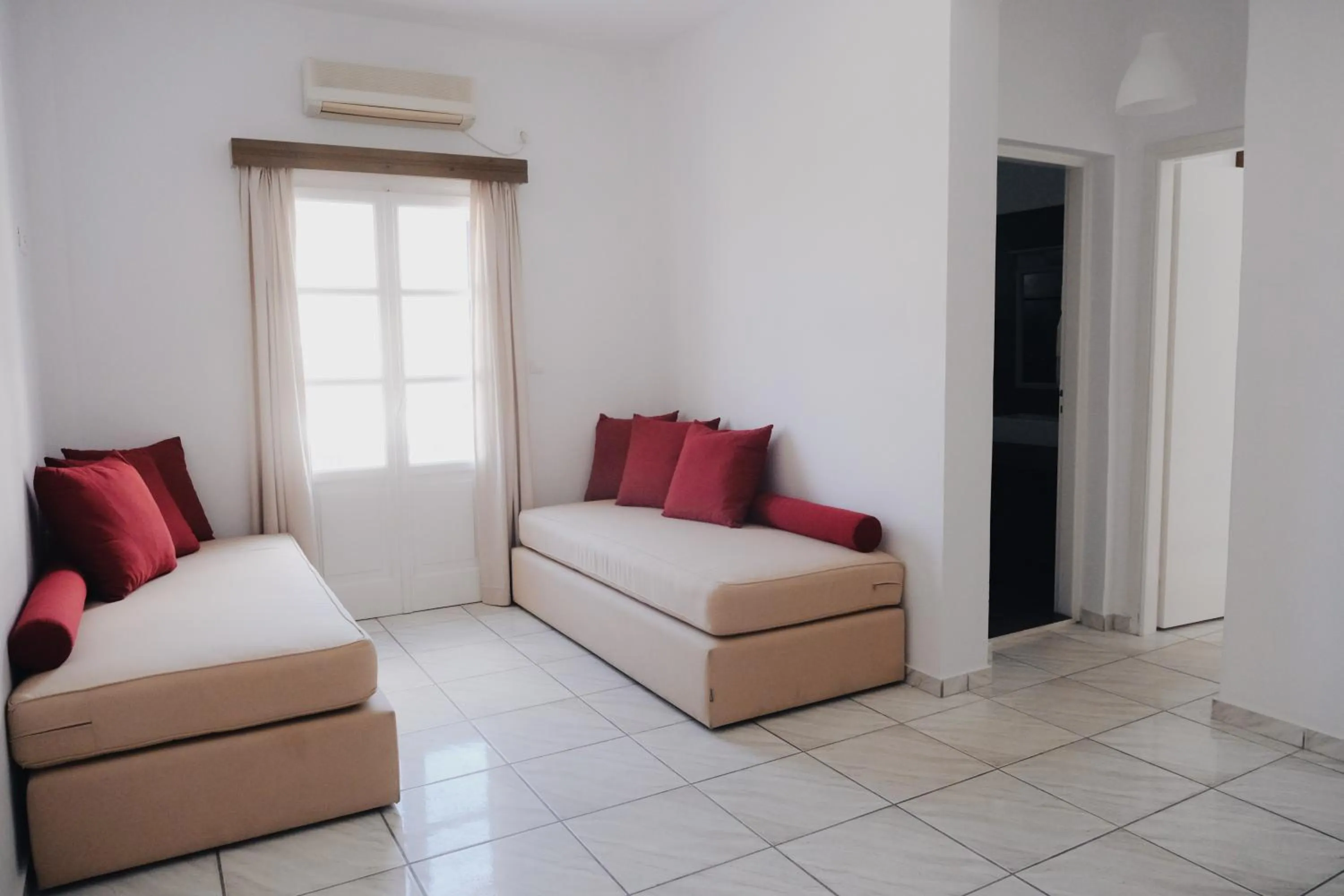 Bed in Paradise Apartments Studios