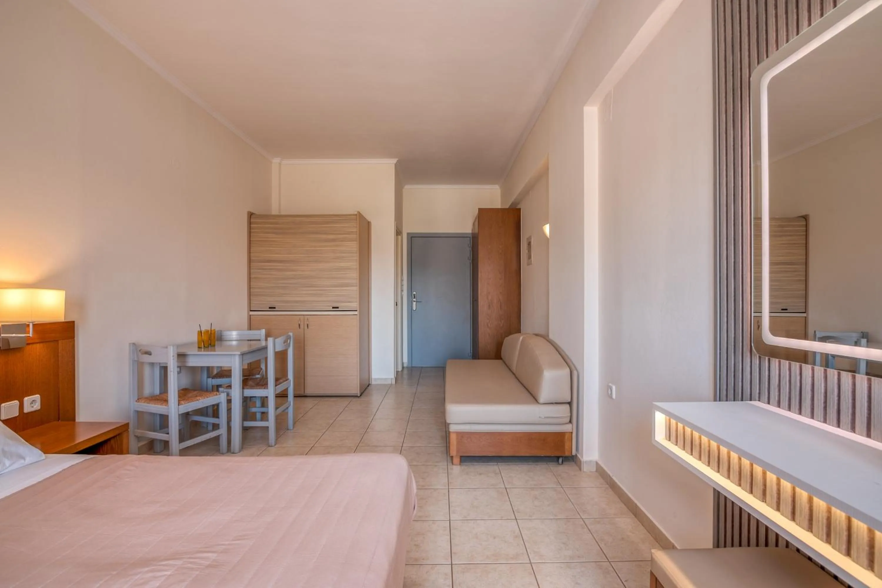 Bed in Christina Beach Hotel