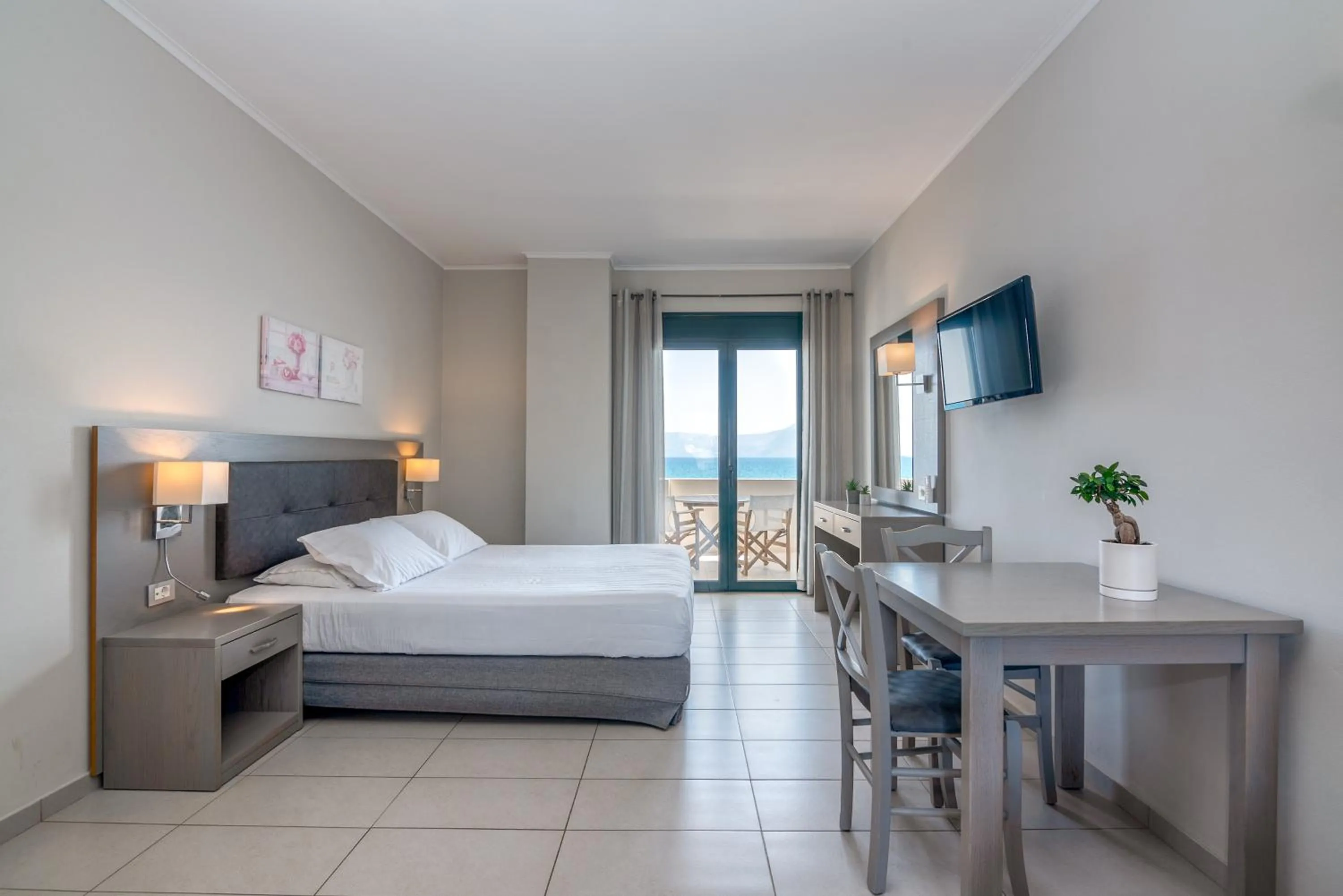 Bed in Christina Beach Hotel