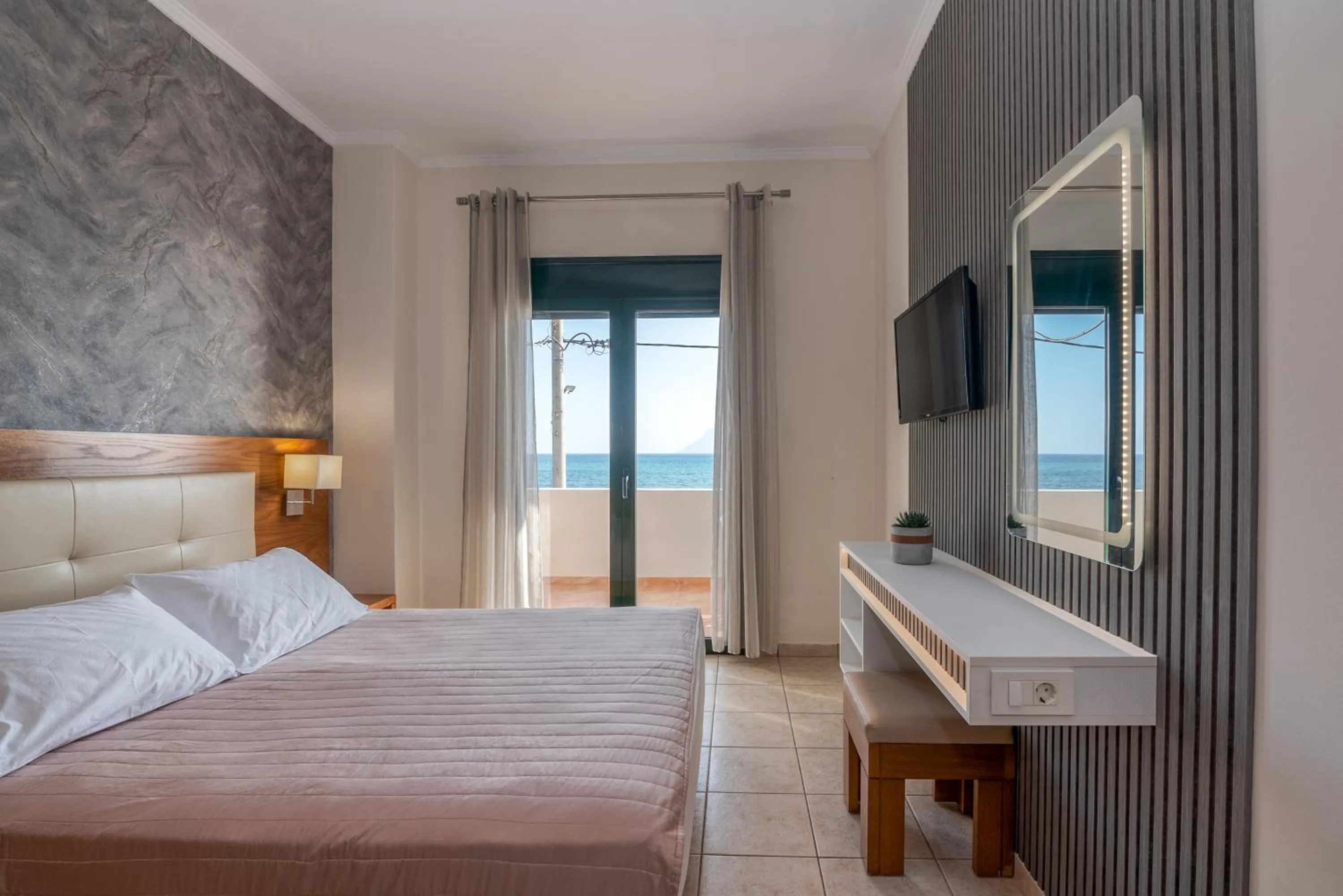 Bed in Christina Beach Hotel