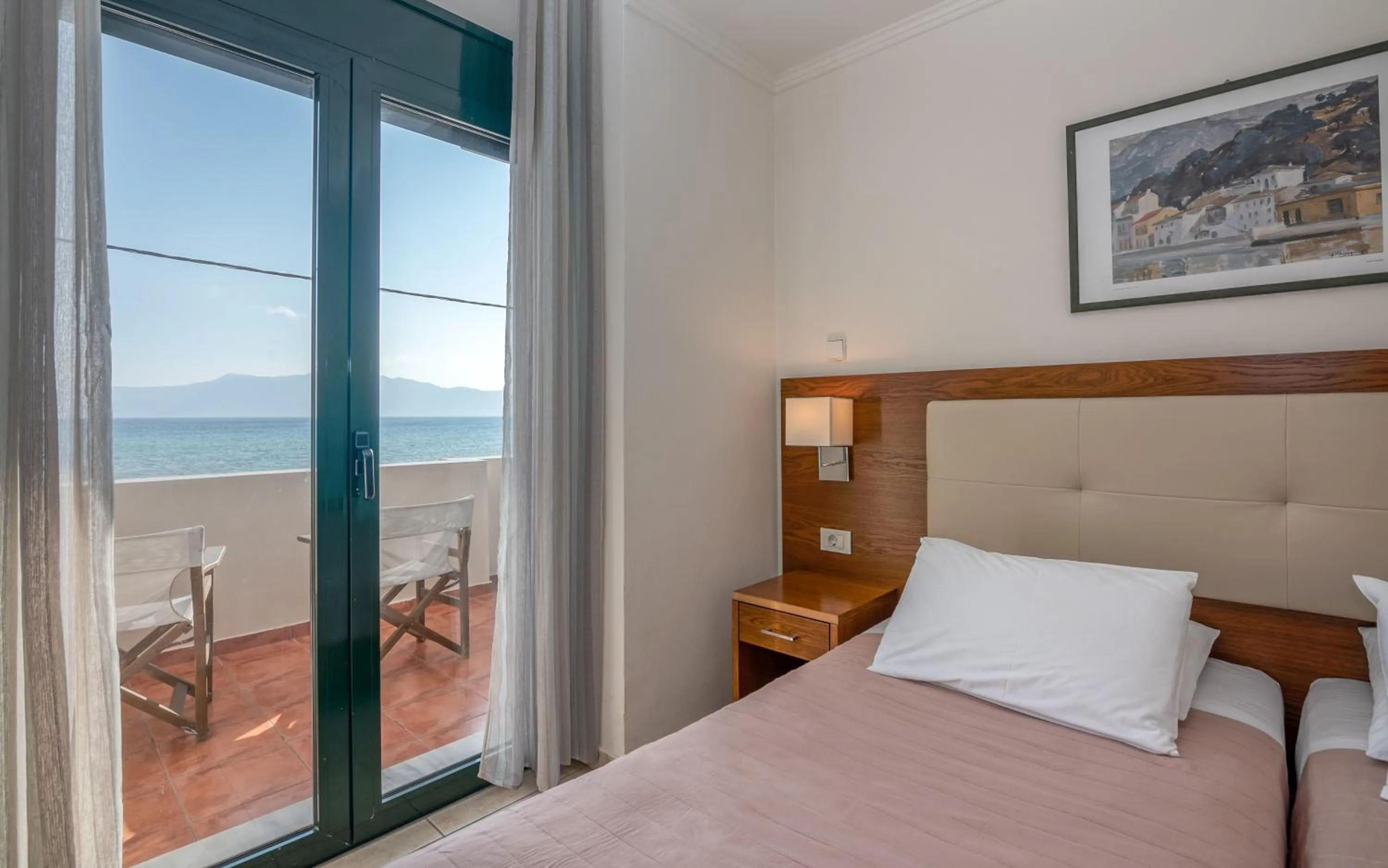 Bed in Christina Beach Hotel