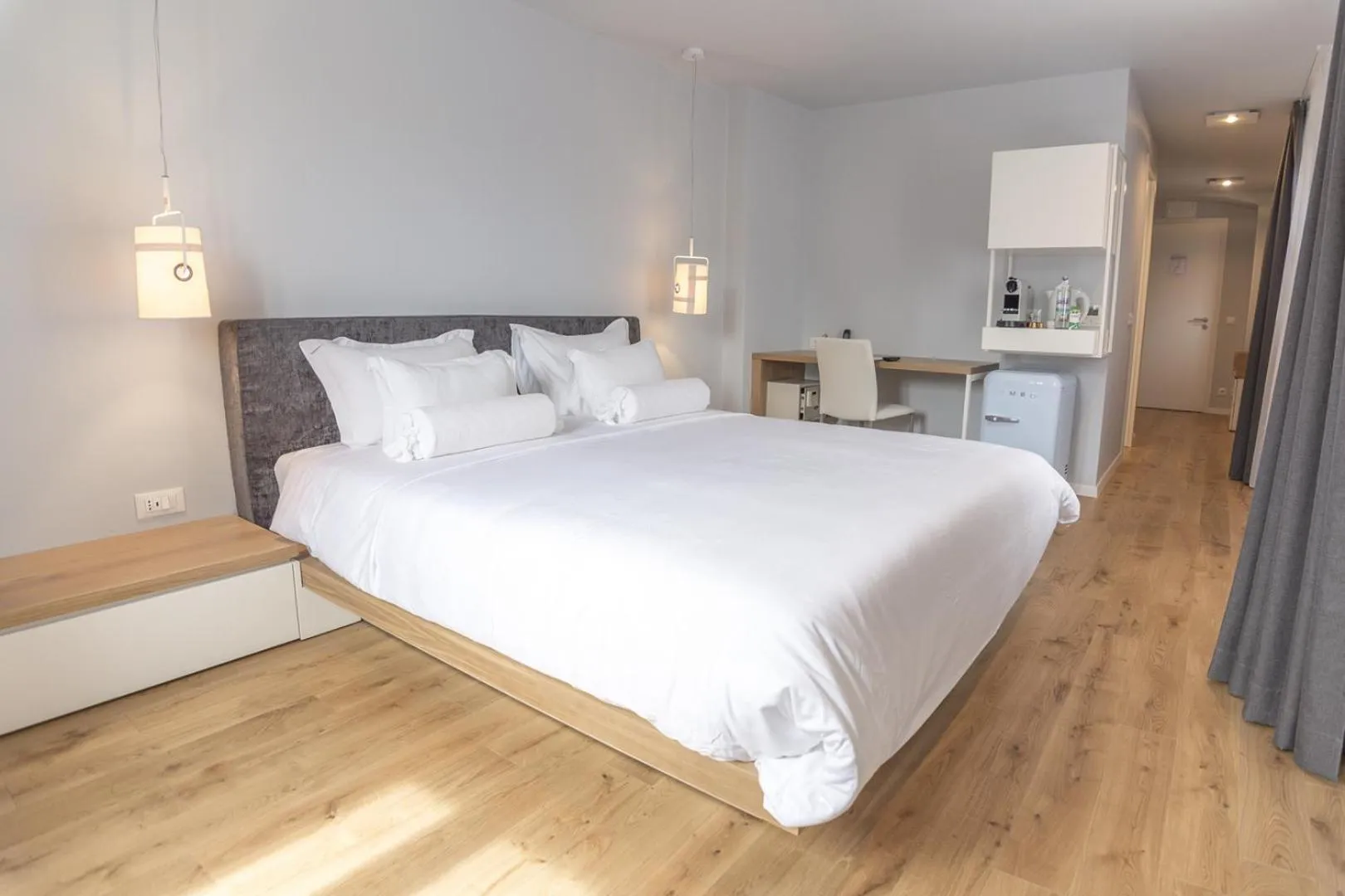 Bed in Divota Apartment Hotel