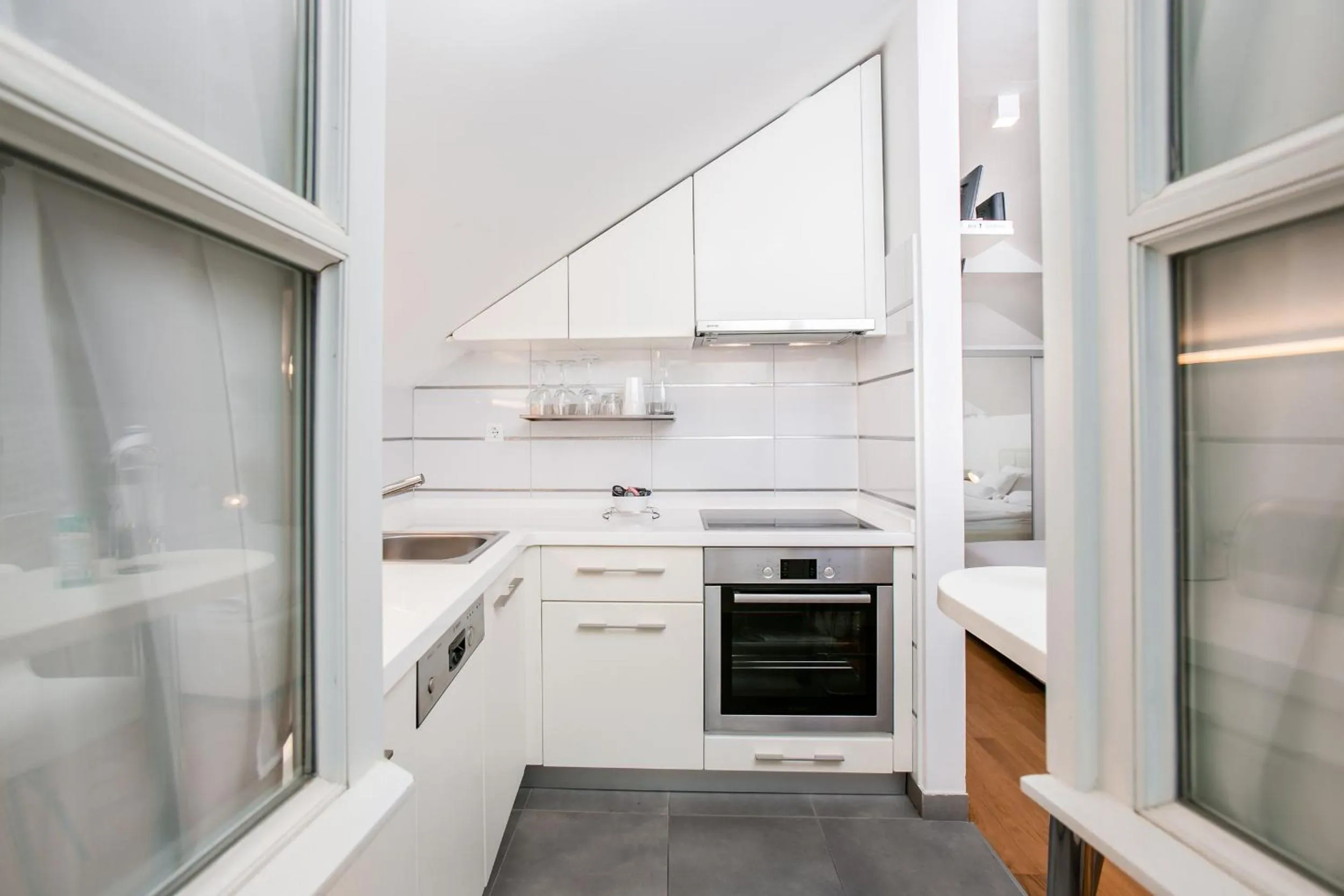 Kitchen or kitchenette in Divota Apartment Hotel